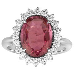 Anello d'oro certificato AGL con zaffiro rosa ovale e diamante da 4,06 carati
