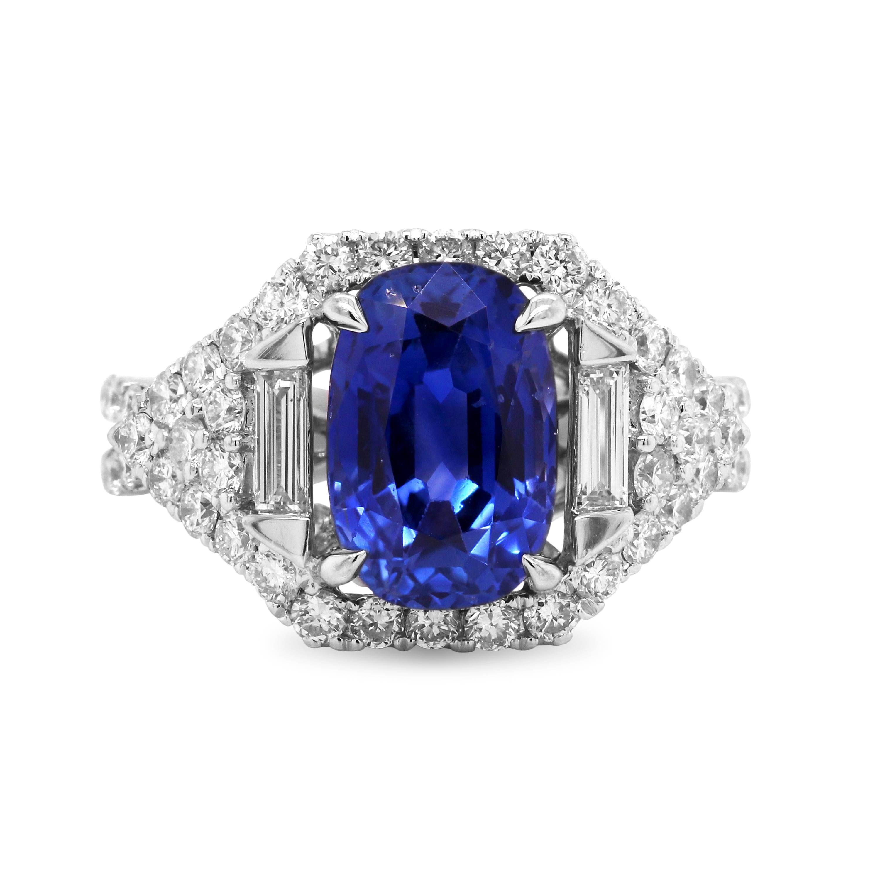 AGL Certified 4.09 Carat No Heat Ceylon Blue Sapphire 14K White Gold Diamond Ring

This exquisite work of art features a cushion-cut, AGL Certified, No Heat Blue Sapphire from Ceylon (Sri Lanka). The ring has round diamonds set all throughout with