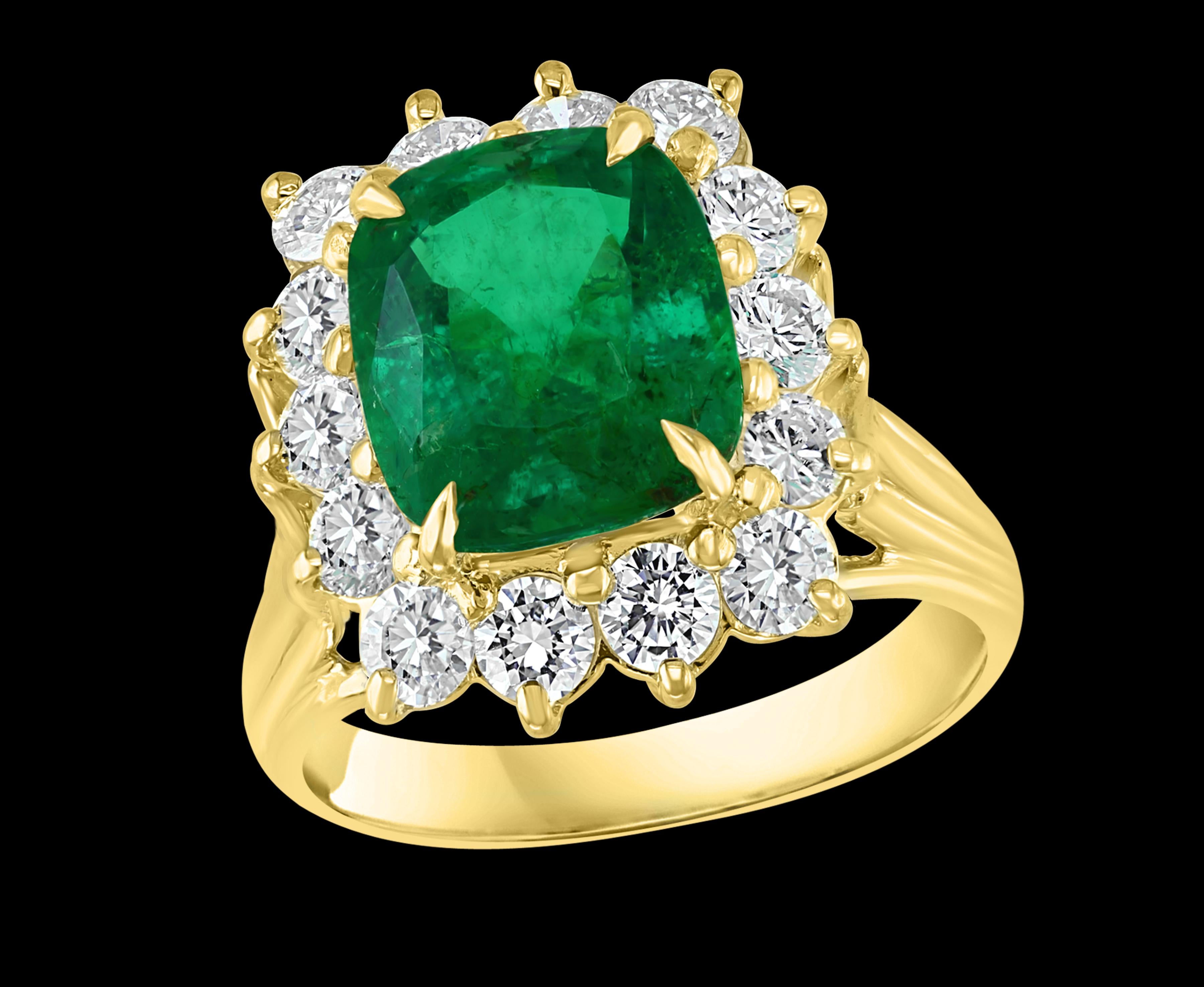 
AGL Certified  4.2 Ct Cushion Cut Colombian Emerald & Diamond Ring 18K Yellow Gold
A Classic, ring 
4.2 Carat  Colombian Emerald Absolutely gorgeous emerald , Very desirable color , Extreme fine quality ,color and luster
18 Karat Yellow gold 6.7