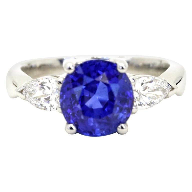 AGL Certified 4.21 Carats Burma Sapphire and Pear Shape Diamonds in Platinum For Sale