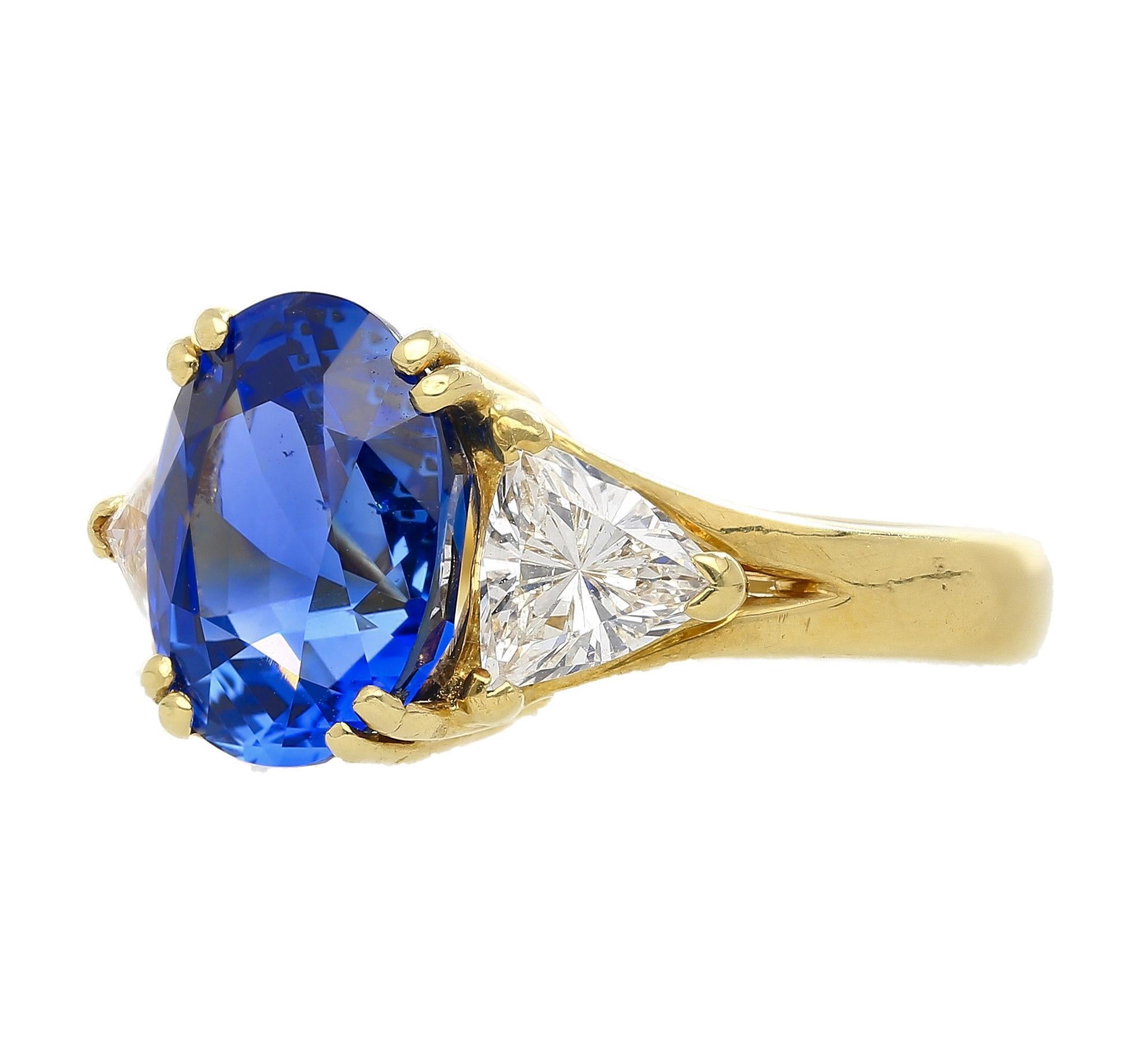 Oval Cut AGL Certified 4.49 Carat Burma No Heat Blue Sapphire and Diamond 3 Stone Ring For Sale