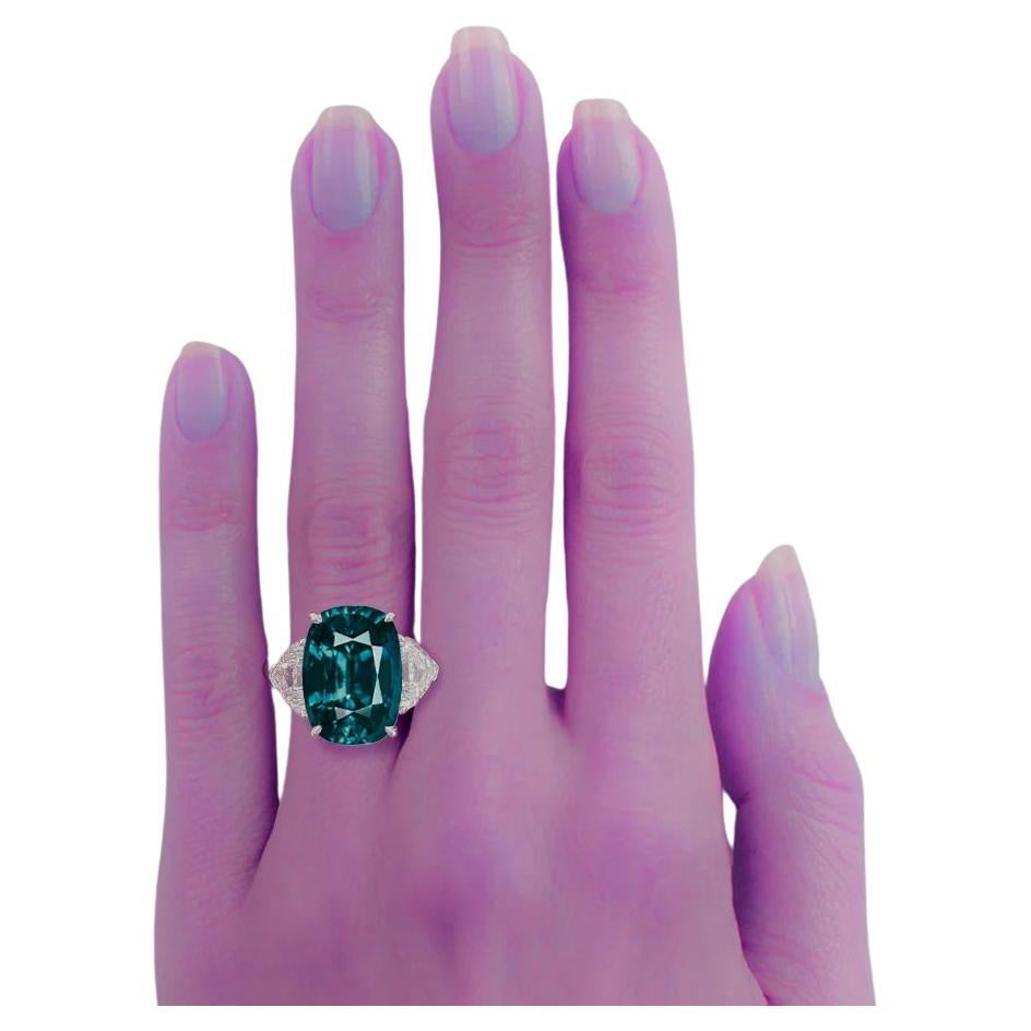 Introducing a truly extraordinary piece of fine jewelry: the AGL Certified 5 Carat blue sapphire diamond Ring.

Immerse yourself in the captivating allure of this exquisite ring, featuring a stunning 5 carat green emerald of unparalleled intensity