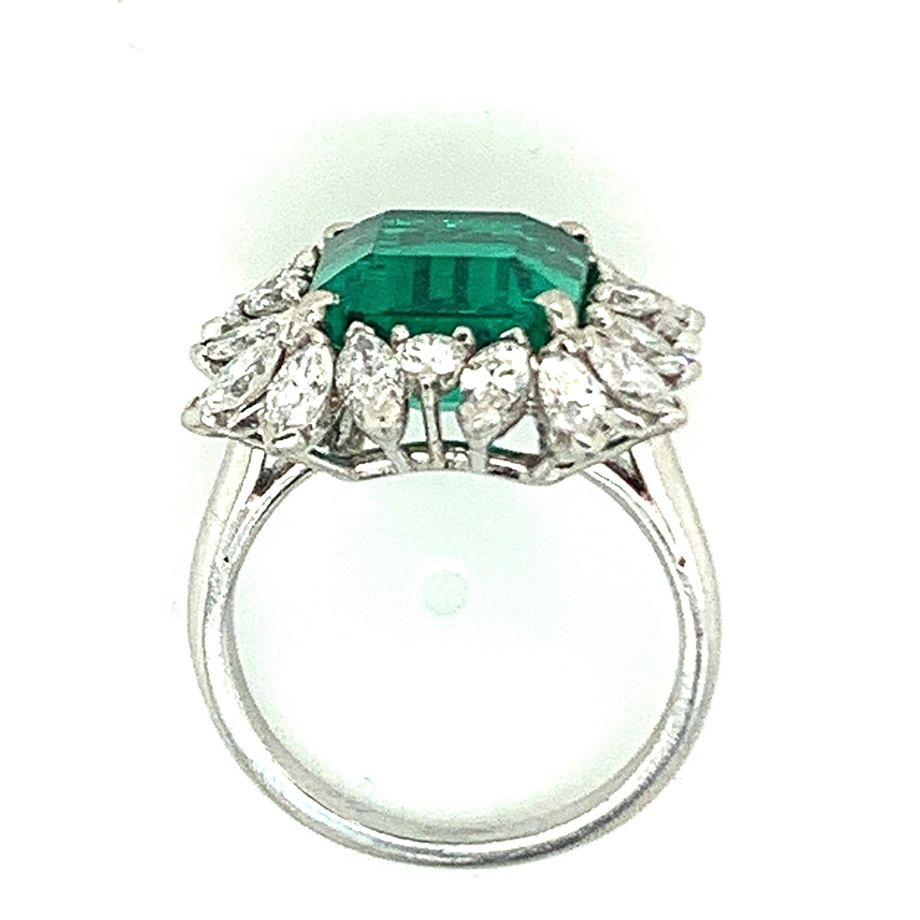 Contemporary AGL Certified 5.05 Carat Colombian Emerald Diamond Platinum Ring