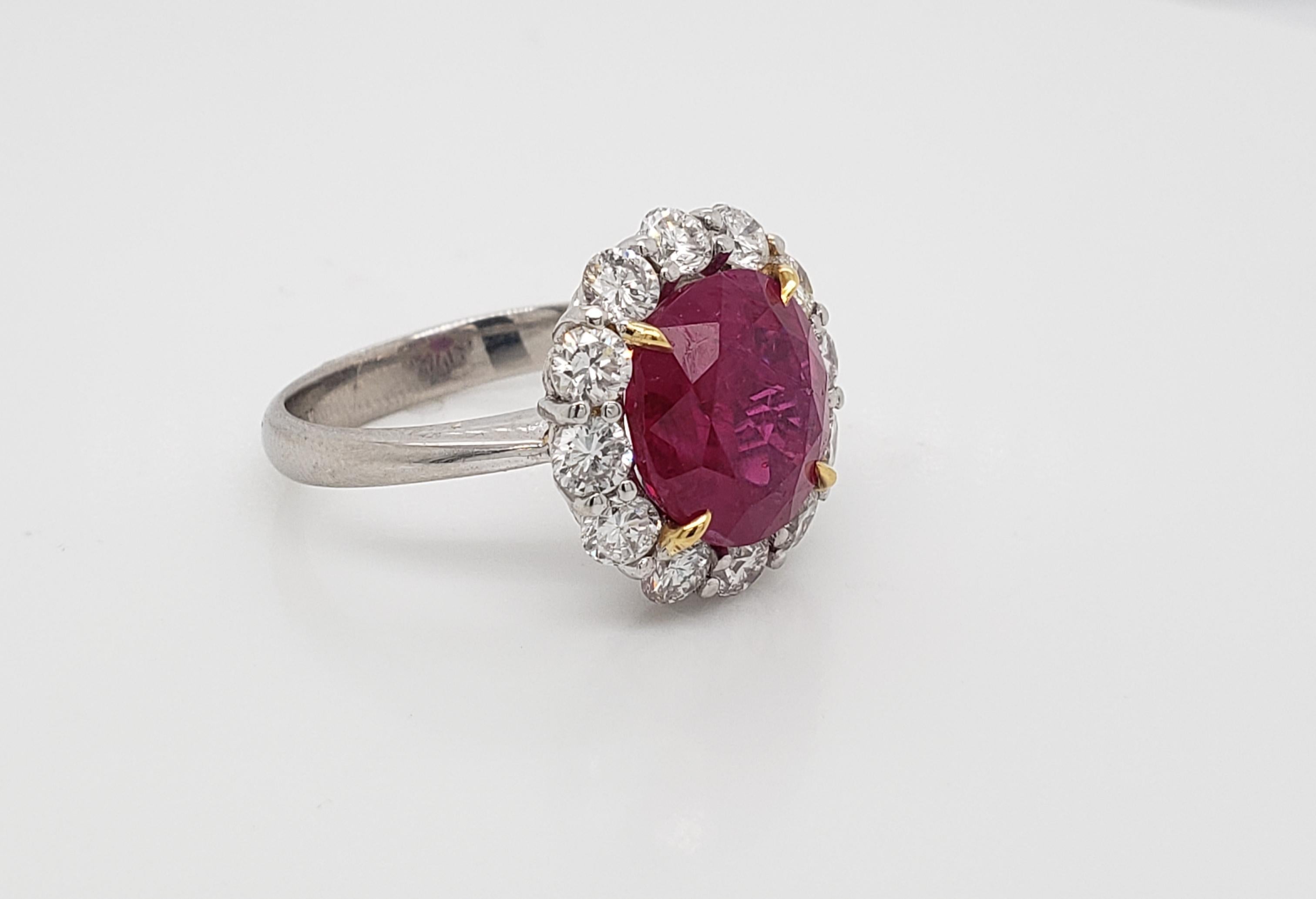 Ruby and Diamond Ring.

AGL Certified Oval-shaped Burma Ruby weighing 5.25 carats flanked by twelve brilliant-cut diamonds weighing a total of 1.20 carats, hand-crafted in platinum. (Sizable)

Classic, elegant item for anyone's collection!

