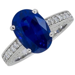 AGL Certified 5.32 Carat Oval Cut Blue Sapphire and Diamond Engagement Ring
