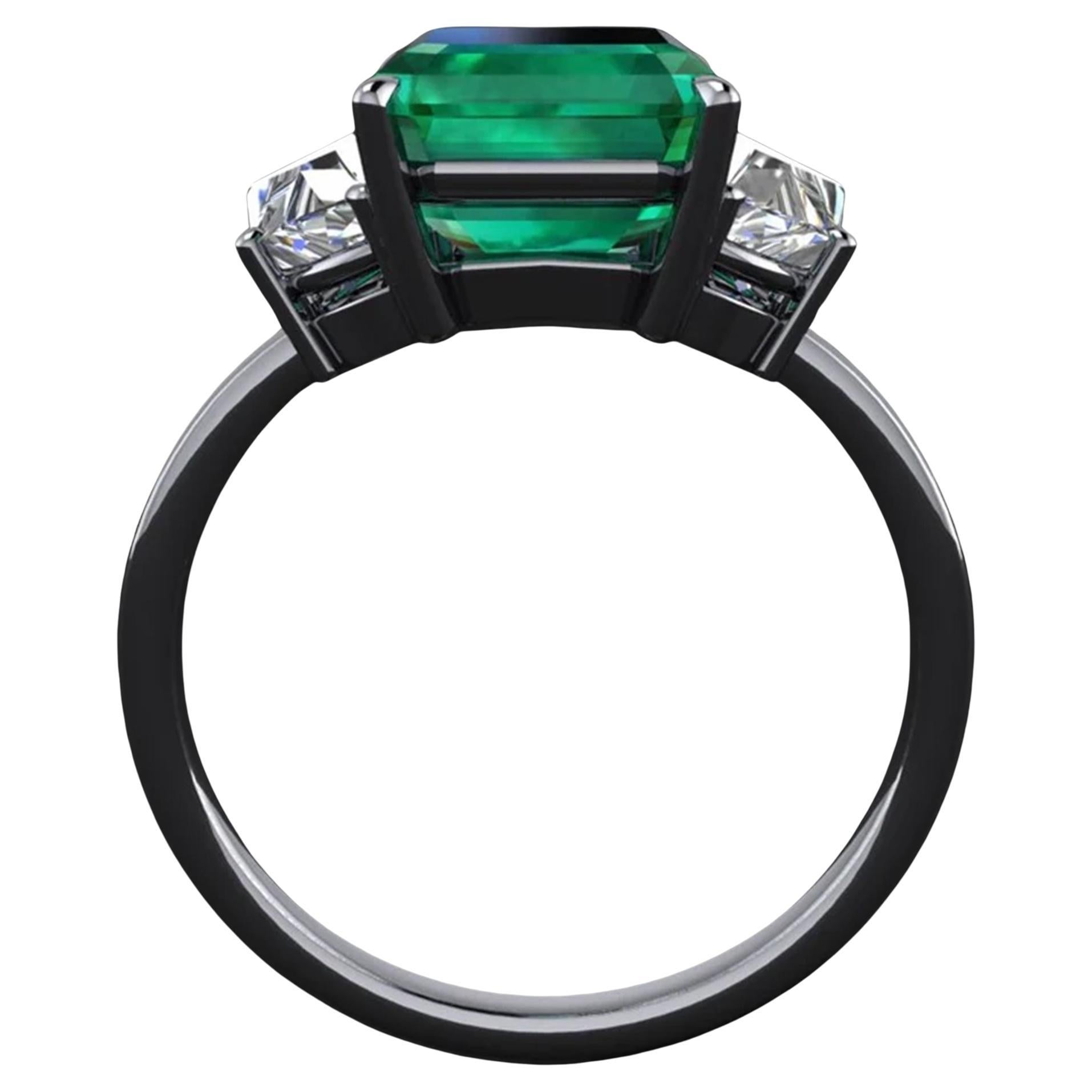 Dieser unverwechselbare Ring verbindet meisterhaft traditionellen Luxus mit modernem Design, gefertigt aus 18 Karat Weißgold und Hightech-Kohlefaser. 
Das Herzstück ist ein atemberaubender, AGL-zertifizierter, natürlicher kolumbianischer Smaragd von
