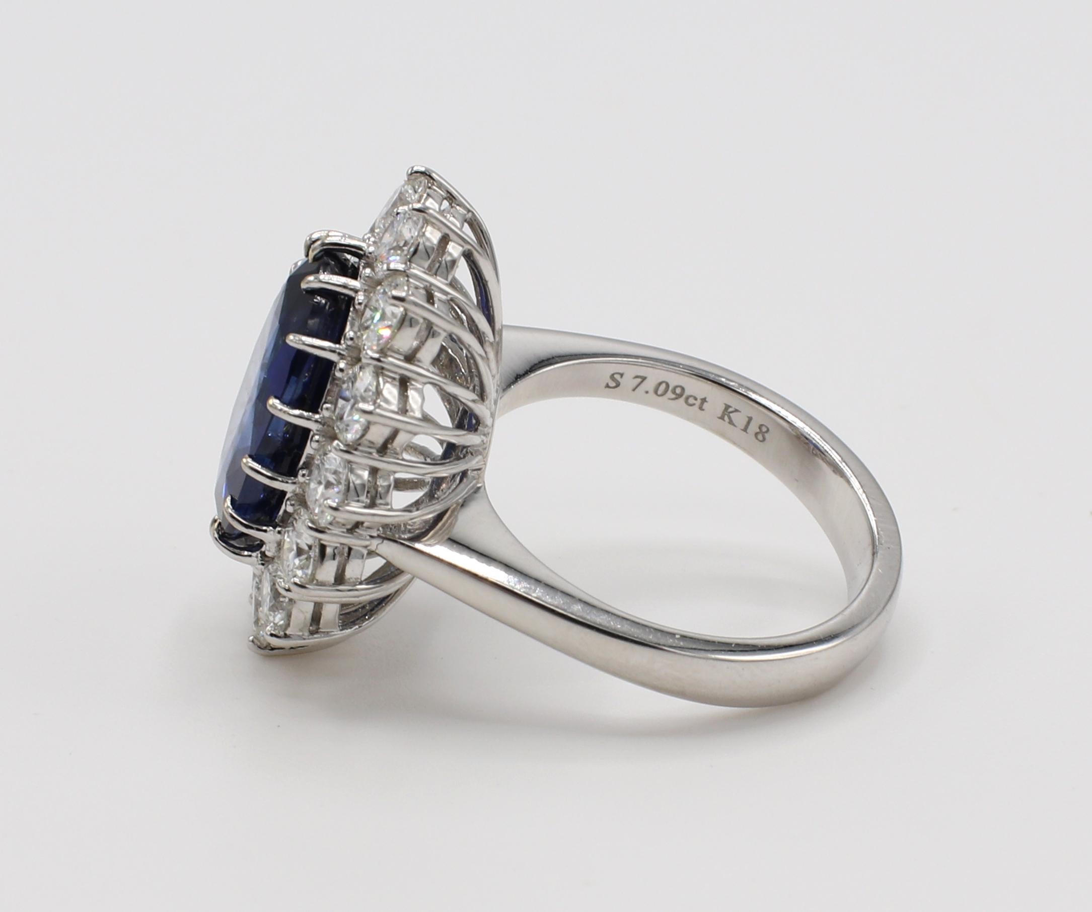 Oval Cut AGL Certified 7.09 Carat Blue Sapphire & Diamond Halo Cocktail Ring