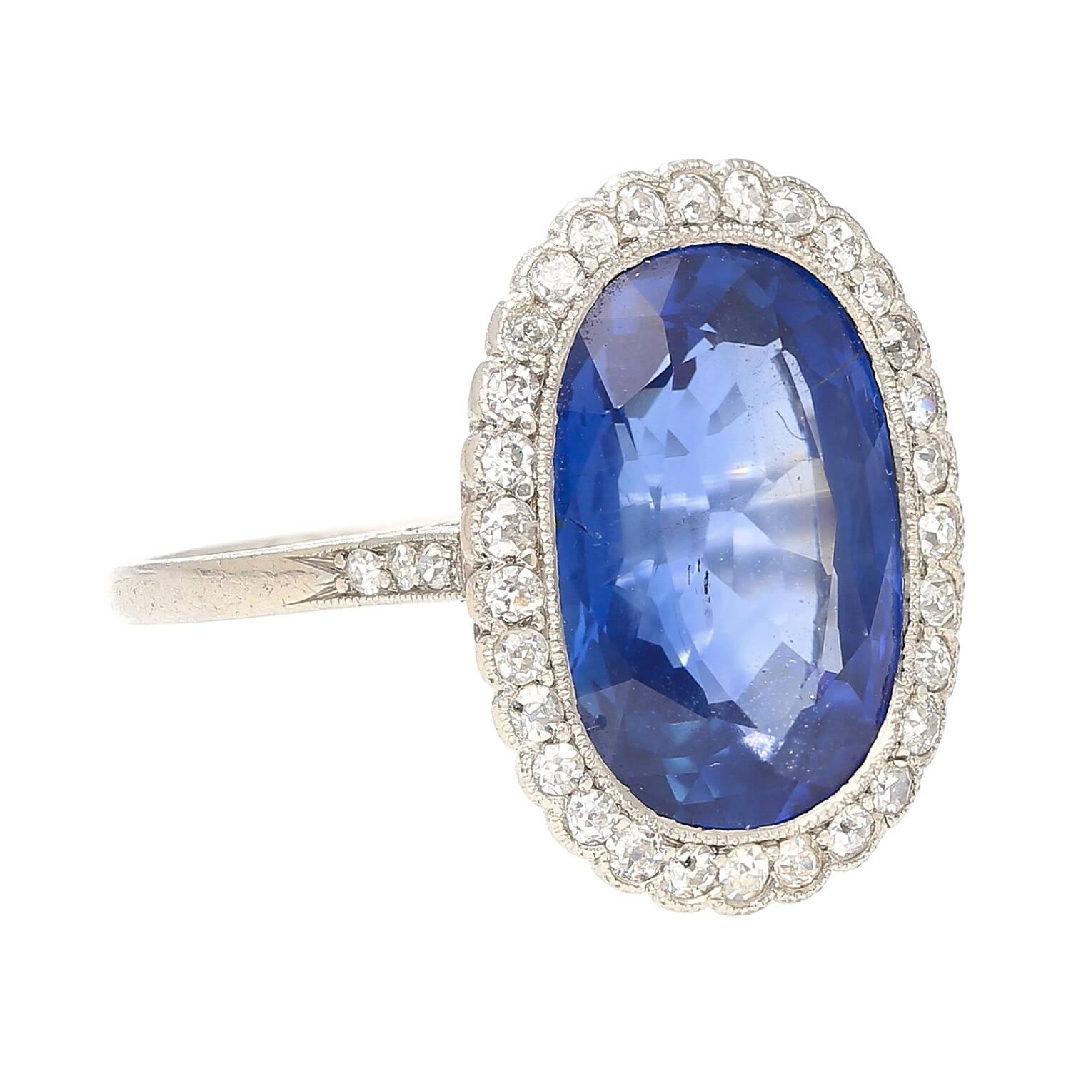Edwardian AGL Certified 7.76 Carat Oval No Heat Burma Blue Sapphire Ring in Platinum For Sale