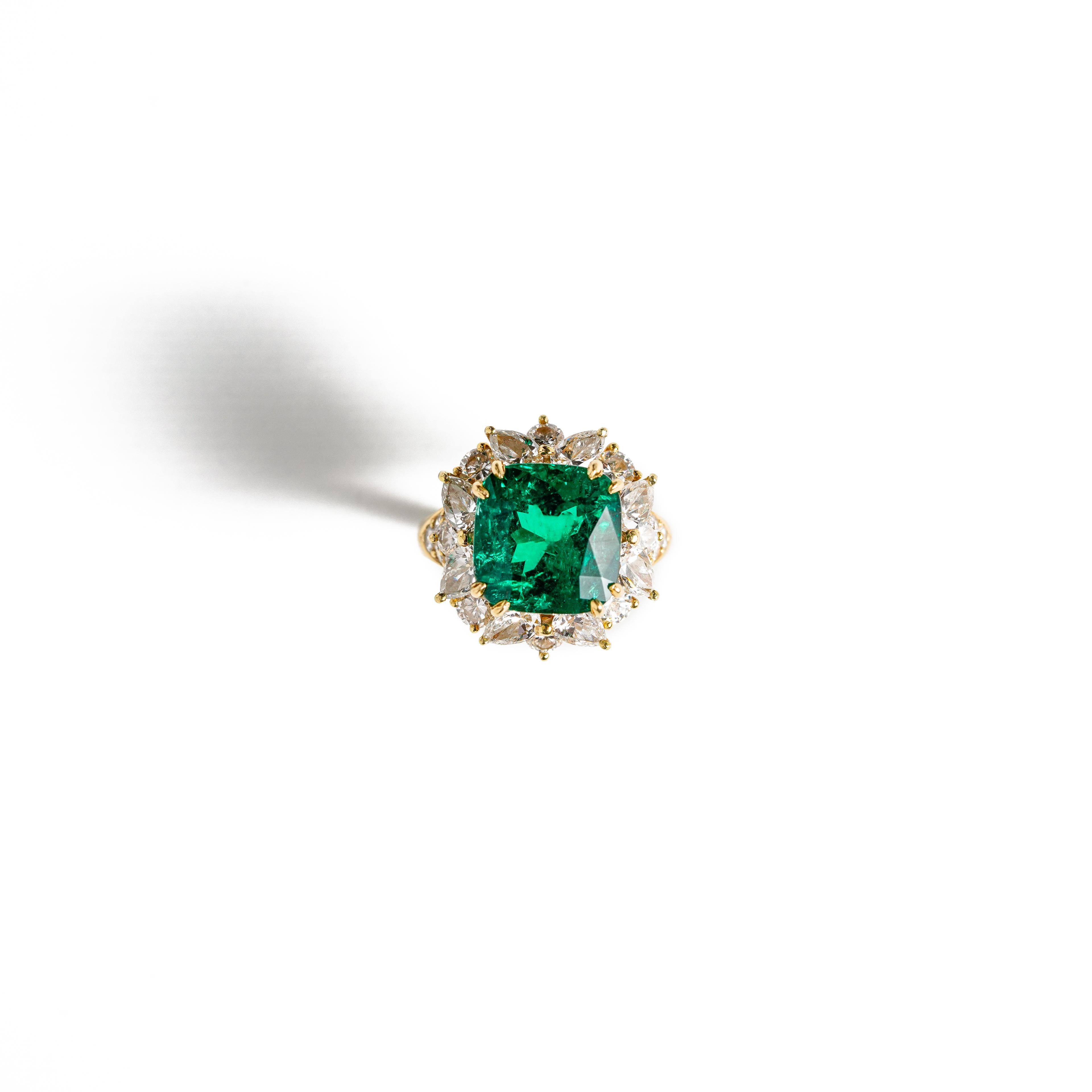 The Colombian Emerald has always been the most desirable of all the emeralds and this one is no exception. Crafted in 18k yellow gold featuring one square cushion Colombian emerald weighing 8.39ct and has minor to moderate clarity enhancement. The