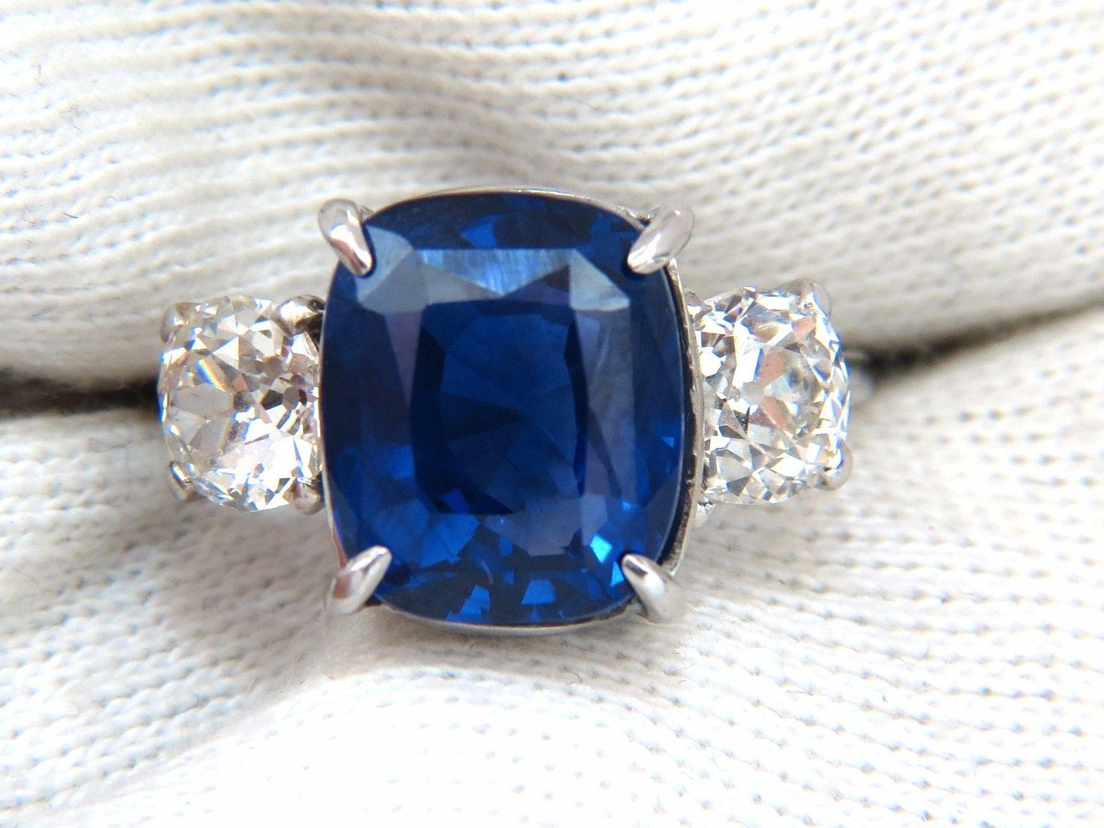 No heat / Classic Three 

AGL Certified 

7.63ct. Natural Blue No heat Sapphire ring.

Report #:  CS82388

Cushion cut: 11.25 X 9.44 X 7.12mm

Transparent, Blue

Sri Lanka Origin



1.60ct. Side natural diamonds &

G color, Vs-2 clarity.

Platinum