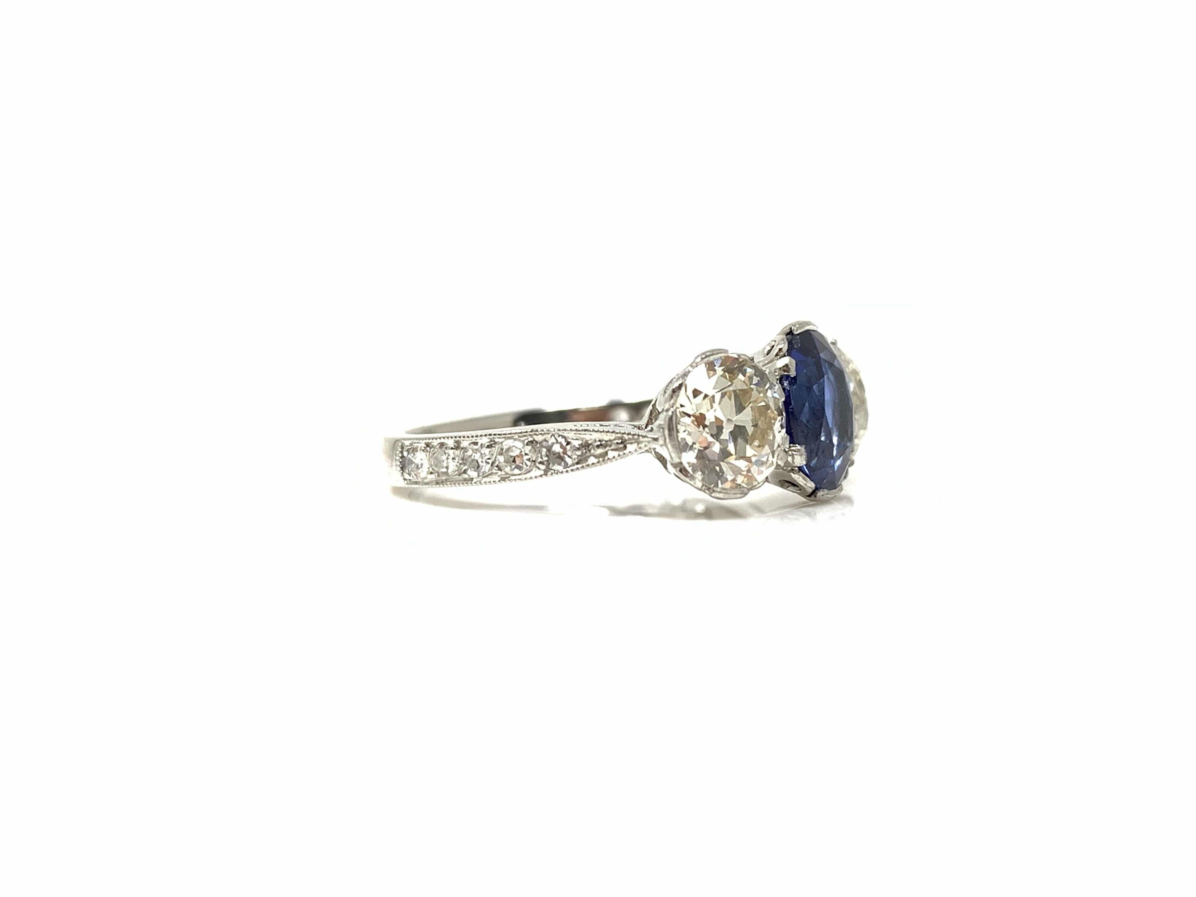 Oval Cut AGL Certified Blue Sapphire Oval Mixed Cut and White Diamond Three-Stone Ring For Sale