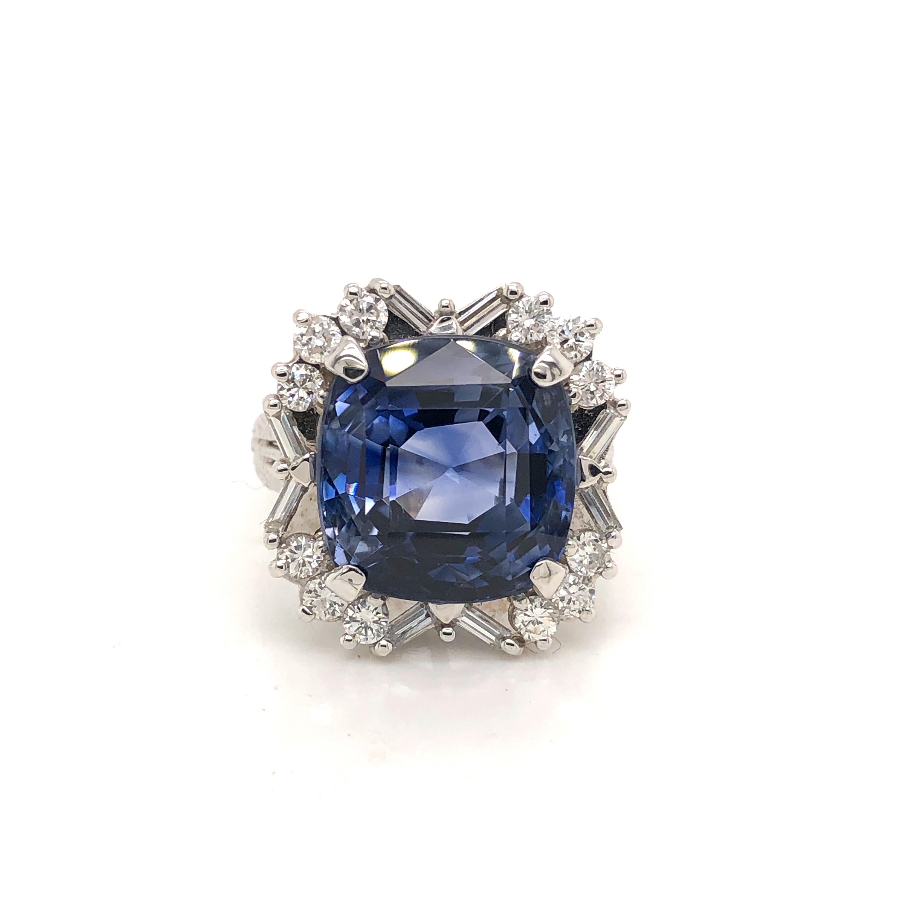 Estate Sapphire and Diamond ring. Focal point of this piece is a gorgeous Ceylon Sapphire cushion cut with a vibrant blue color. The stone weighs 16.44 Ct. and measures 13.51 x 13.03 x 9.26 mm. This natural corundum gemstone comes with paperwork