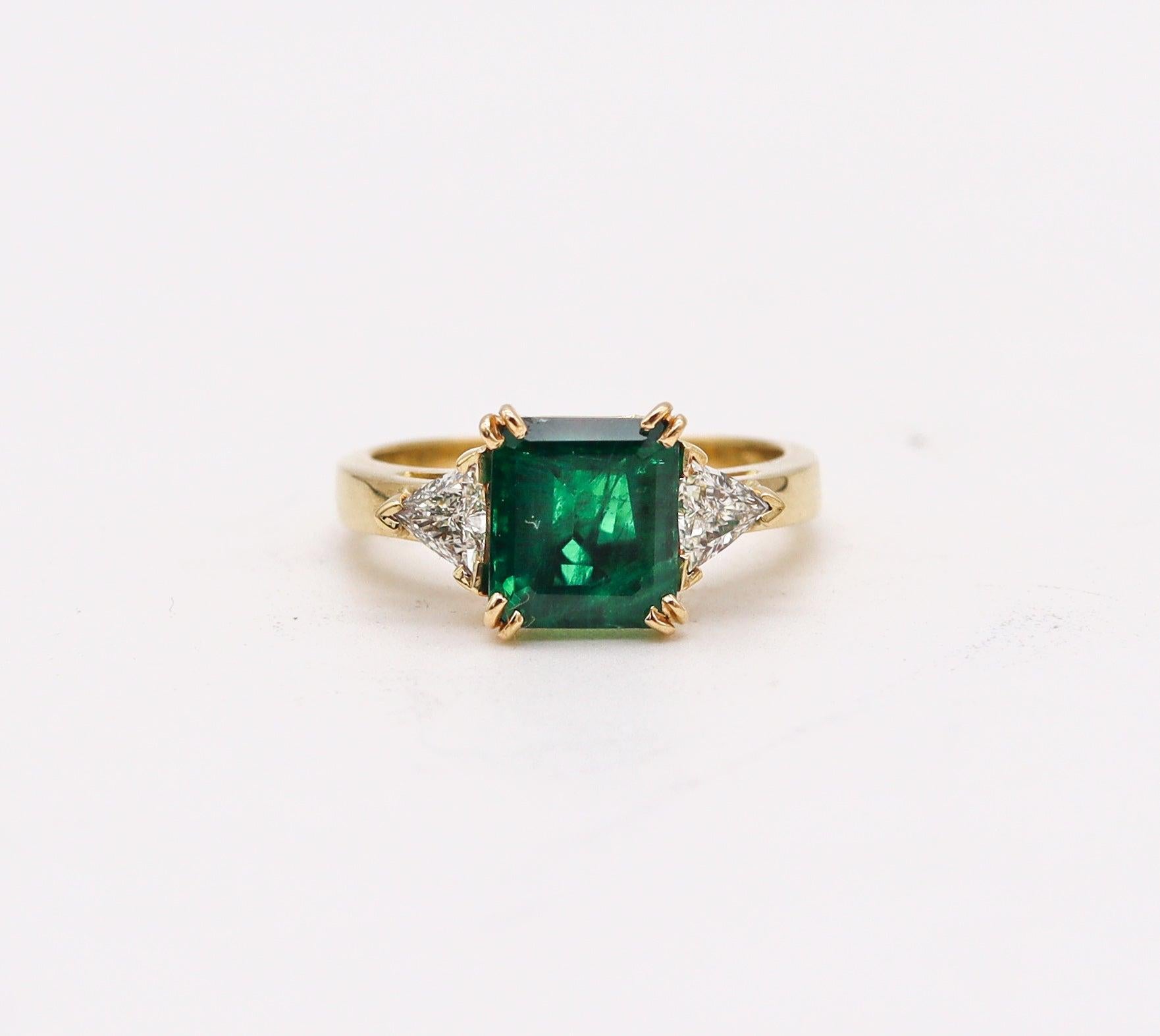Gorgeous AGL certified emerald and diamonds ring.

This is a modern classic three-stones setting ring, carefully crafted in solid 18 karats yellow gold with high polished finish. The ring is embellished with three earth mined natural gemstones, such