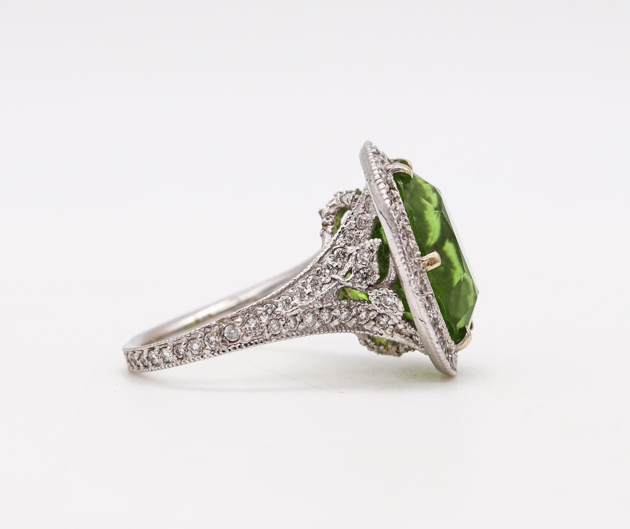 Gem-set cocktail ring with Burmese Peridot.

Beautiful contemporary ring, crafted with Edwardian patterns in solid white gold of 18 karats. The ring is composed by an halo and a main corp mounted with a full pave.

The center is mount in a