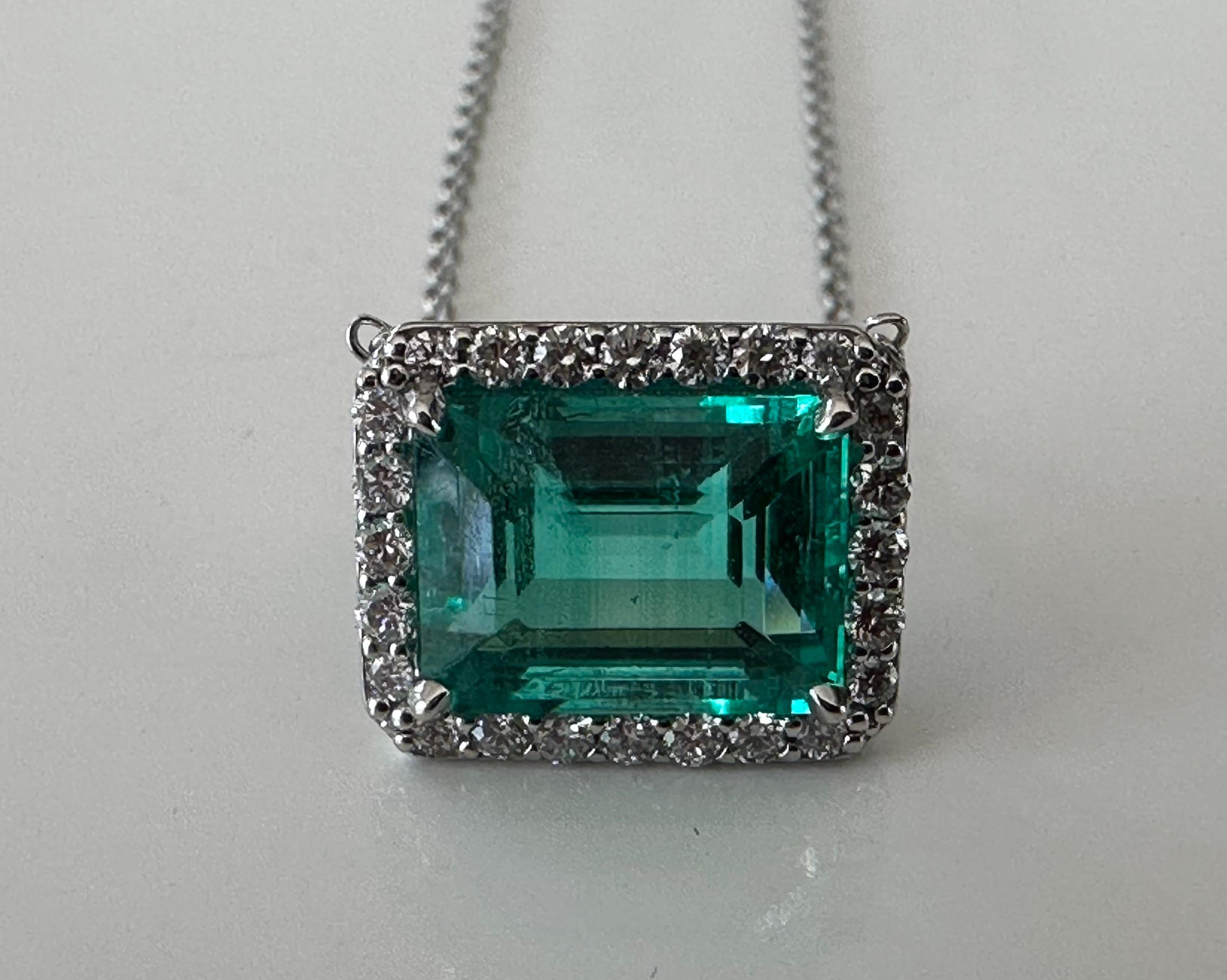 Emerald Cut AGL Certified Colombian Emerald and Diamond Halo Pendant Necklace For Sale