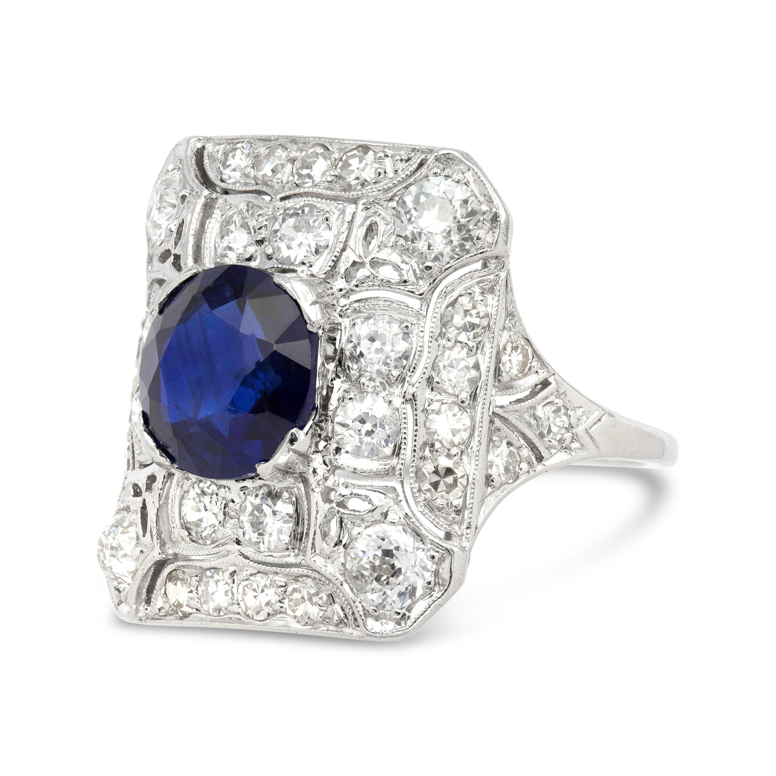 Let there be light! This vintage beauty dates back to the Edwardian era and features a velvety blue, natural and unheated 2.98 ct. Burmese sapphire at the center. It's surrounded by a flurry of sparkling bead-set old European and single cut