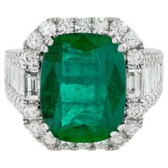 AGL Certified Emerald ring with diamonds in white gold.
