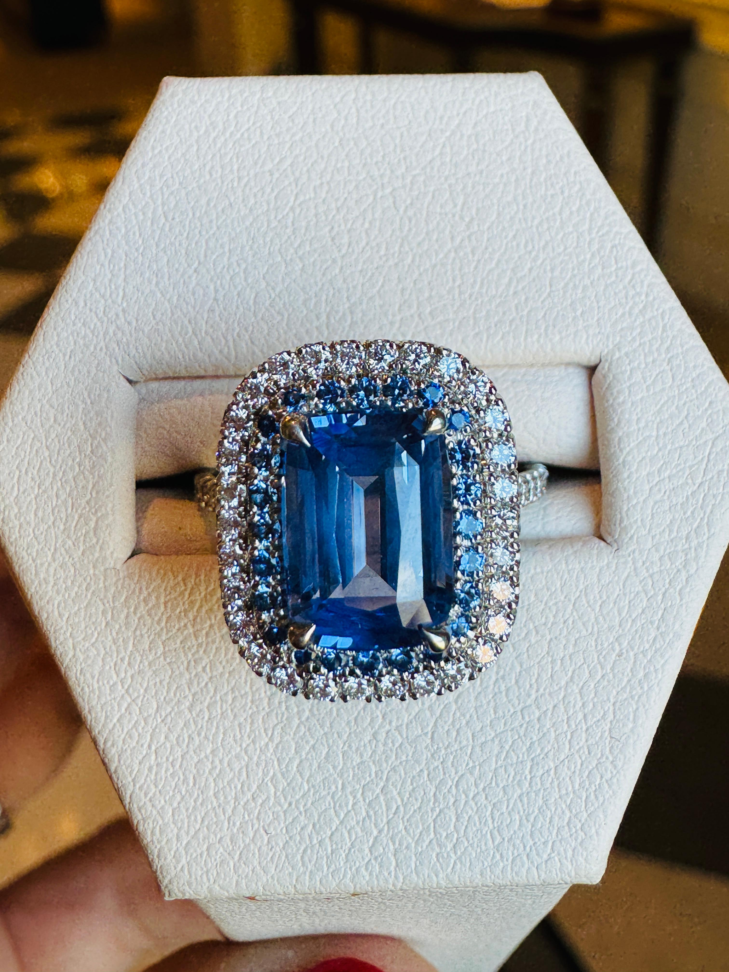 Cushion Cut Natural Sapphire from Sri Lanka with Double Halo containing 24 blue no heat sapphires totaling 0.24ct and 56 diamonds totaling 0.72ct F/VS set in platinum 