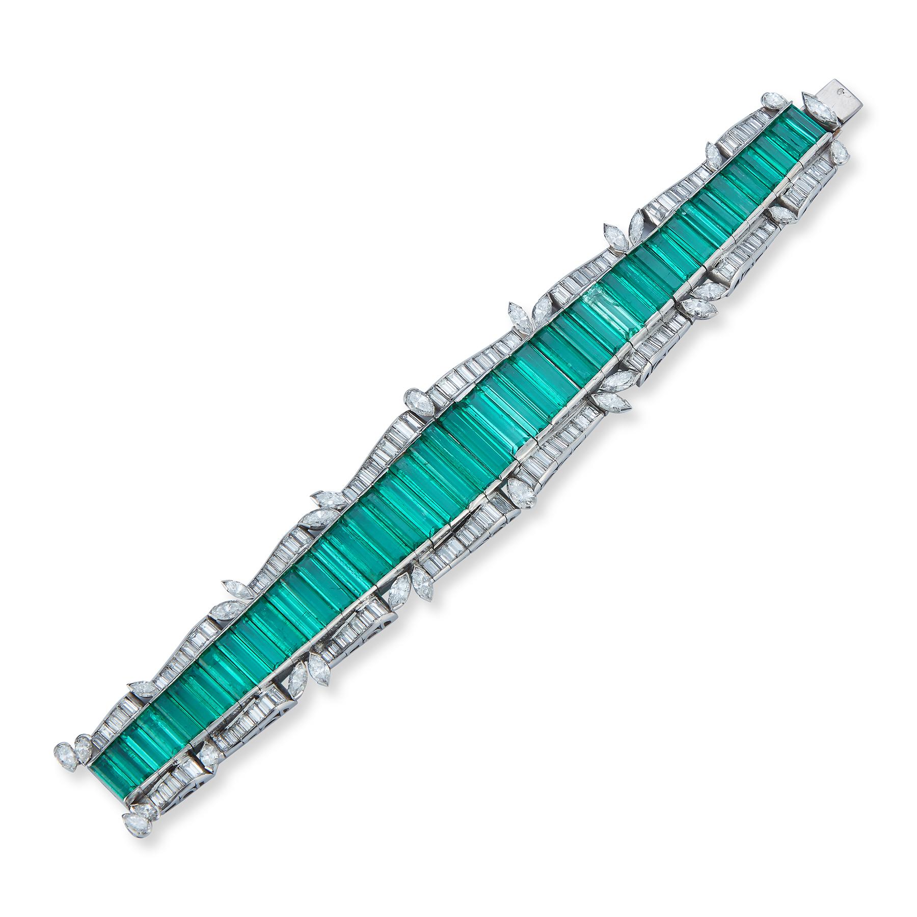 AGL Certified Colombian Emerald Bracelet

 1 row 44 baguette cut  Colombian emeralds.  2 rows of baguette Pear & marquise cut diamonds on each side of the emeralds all set in platinum & 18k white gold. included with a 1.18