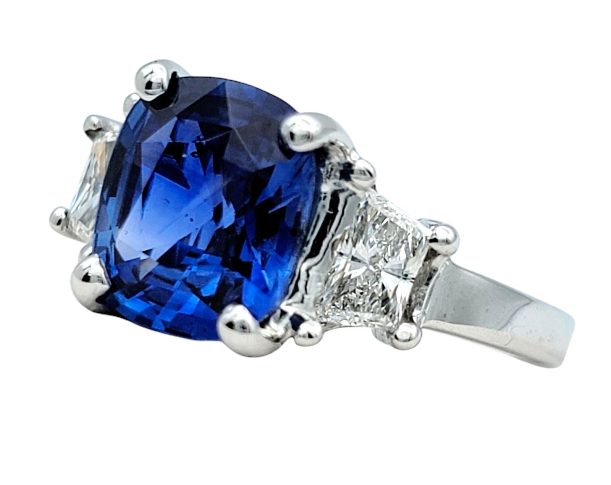 Contemporary AGL Certified Cushion Cut Madagascar Blue Sapphire and Diamond Three-Stone Ring For Sale