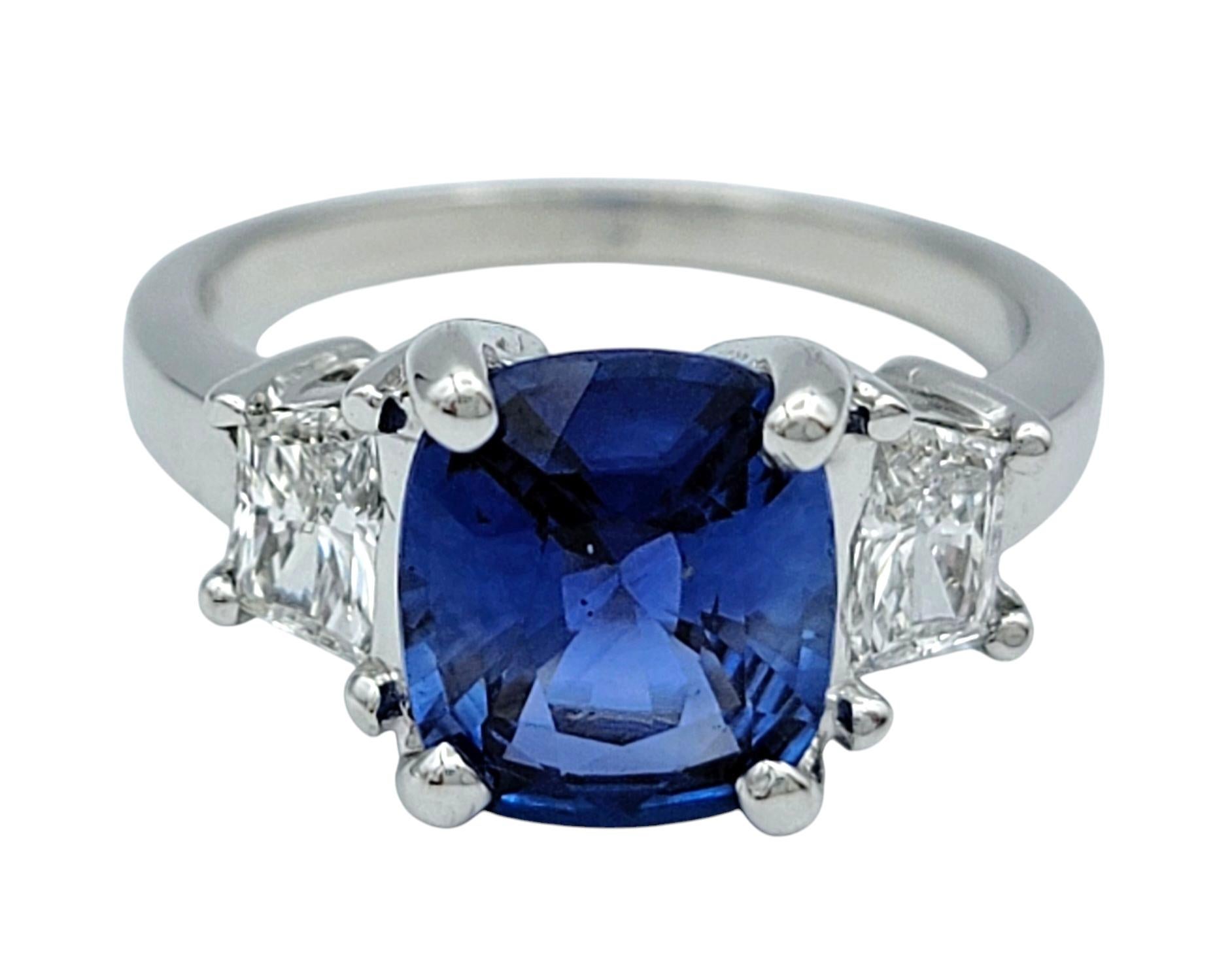 Women's AGL Certified Cushion Cut Madagascar Blue Sapphire and Diamond Three-Stone Ring For Sale