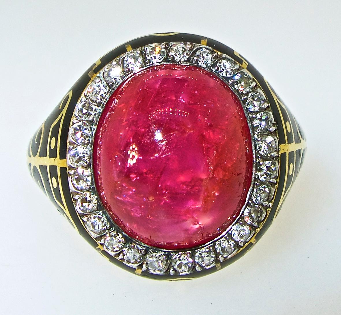 AGL certified to be a natural unheated, untreated Burma ruby weighing approximately 8.5 cts.  This antique ring in gold and silver is quite unusual with fine detailed black enamel, in perfect condition and with old cut diamonds surrounding the ruby.