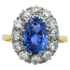 Anillo Halo de Zafiro de Ceilán y Diamante Certificado AGL Sin Calor, Platino y Oro de 18K