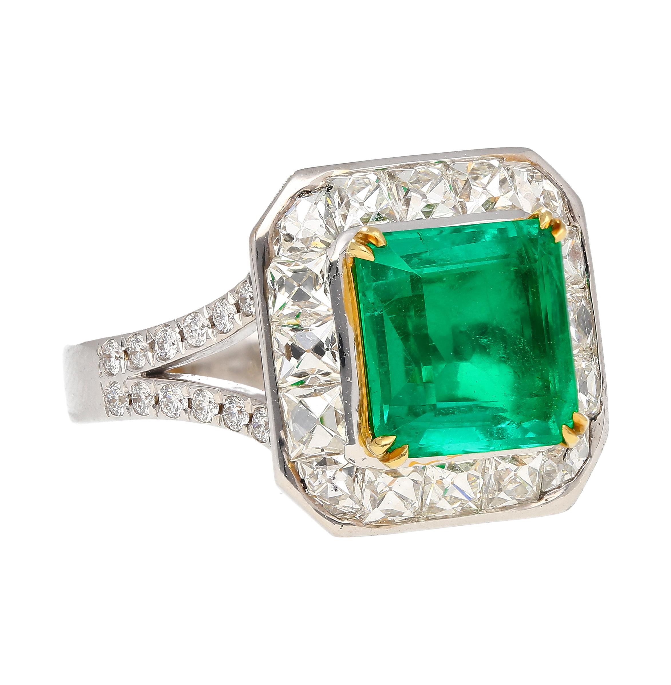 AGL Certified No Oil 2.54 Carat Colombian Emerald and French Old Cut Diamond Halo Ring in 18K White and Yellow Gold.

The emerald center stone is a true marvel of nature. An untreated Colombian natural emerald with fantastic luster and crystal. The
