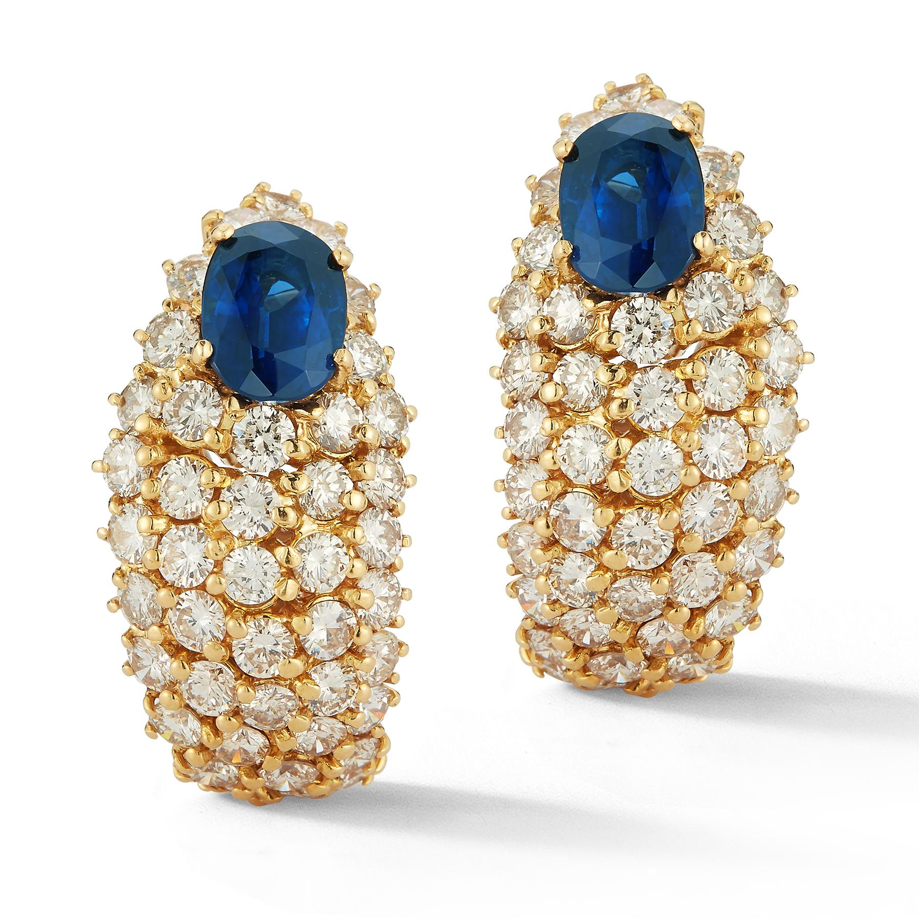 AGL Certified Oval Cut Sapphire & Diamond Gold Earrings , 2 oval sapphires surrounded by 88 round cut diamonds set in 18k yellow gold 

Diamond Weight: approximately 7.92 cts 
Sapphire Weight: approximately 6.48 cts 

Back Type: clip on with post