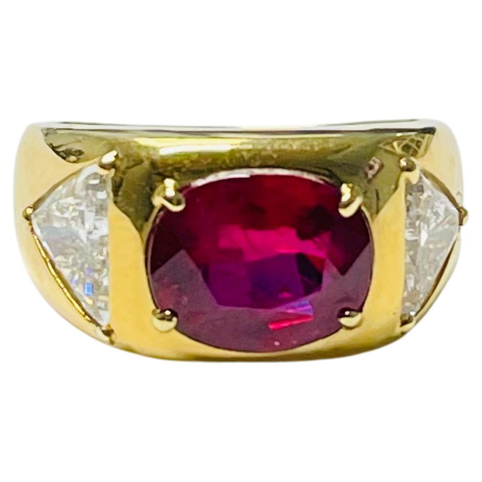 AGL Certified oval ruby( Thai origin and heated )  and trillion diamonds engagement ring beautifully handcrafted in 18k yellow gold . 
The details are as follows : 
Ruby weight : 2.78 carats 
color : pigeon red 
Trillion diamond weight : 1.50 carats