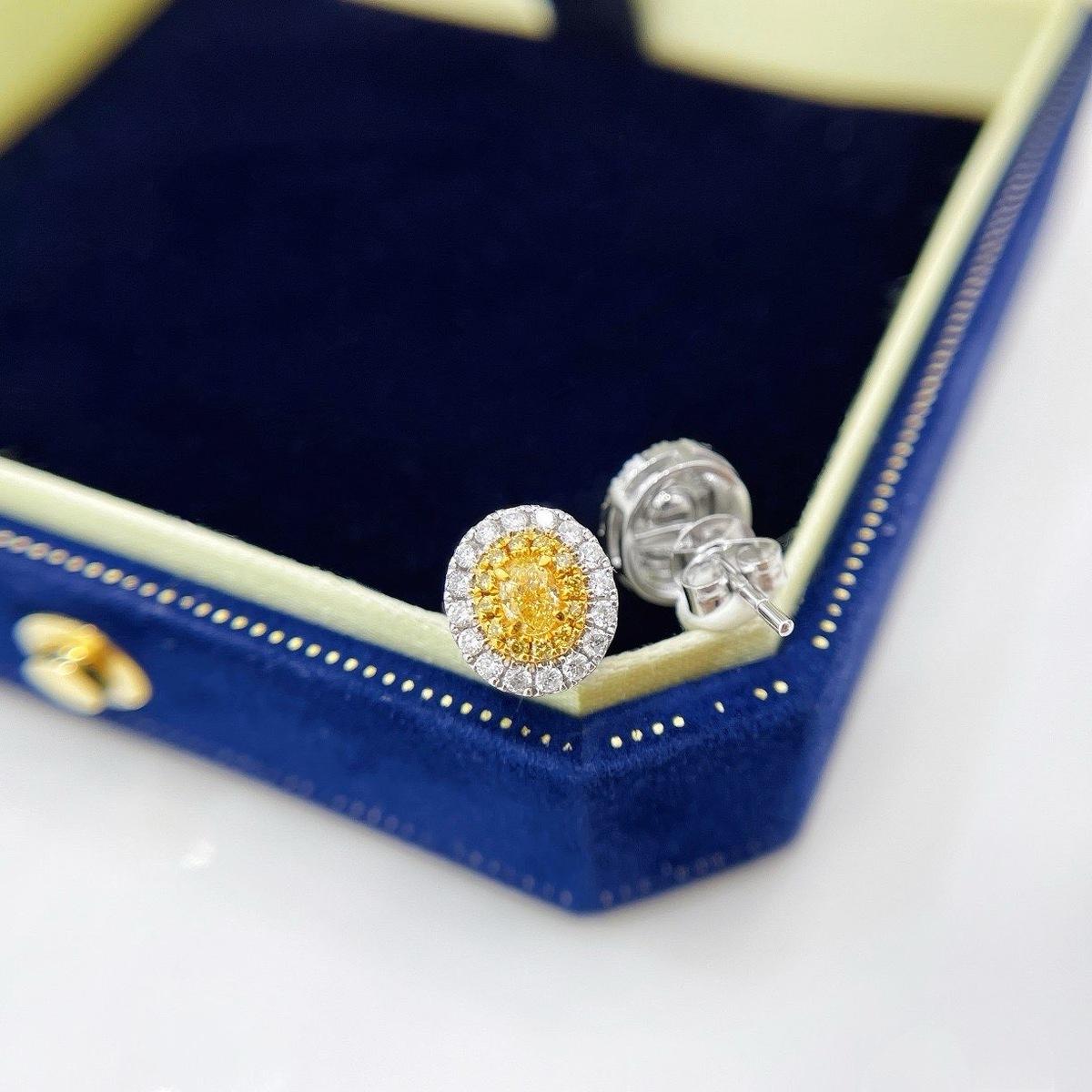 Modern AGL Certified Oval Yellow Diamond & Diamond 18K White Gold Stud Earrings For Sale