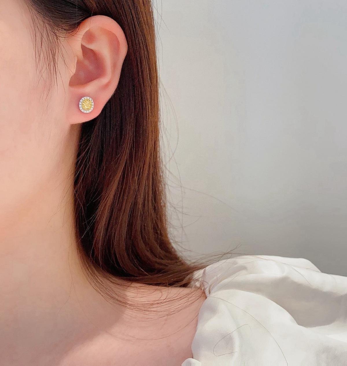Oval Cut AGL Certified Oval Yellow Diamond & Diamond 18K White Gold Stud Earrings For Sale
