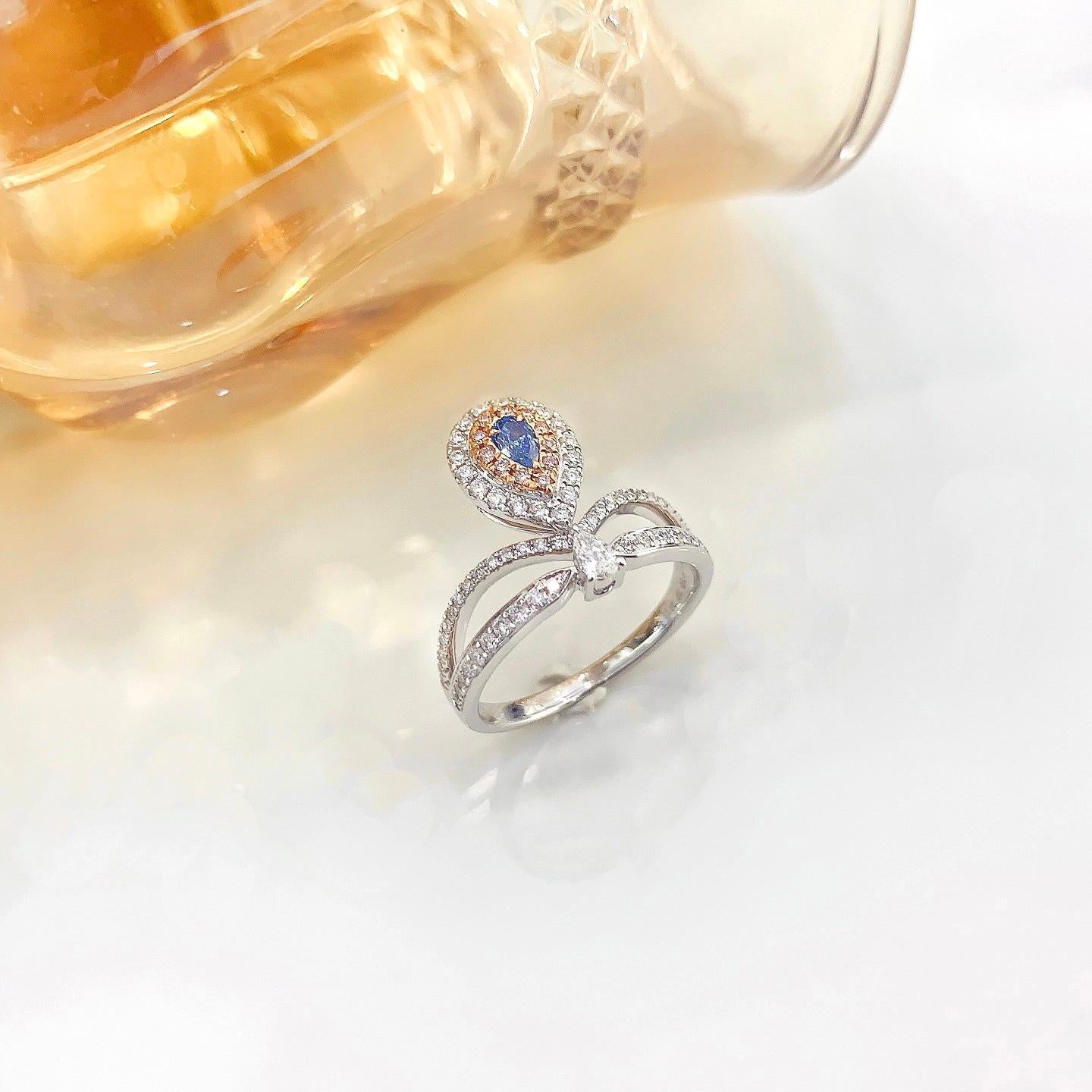 AGL Certified Pear-Cut Blue Diamond 18K Gold Ring with Diamonds In New Condition For Sale In Kowloon, HK