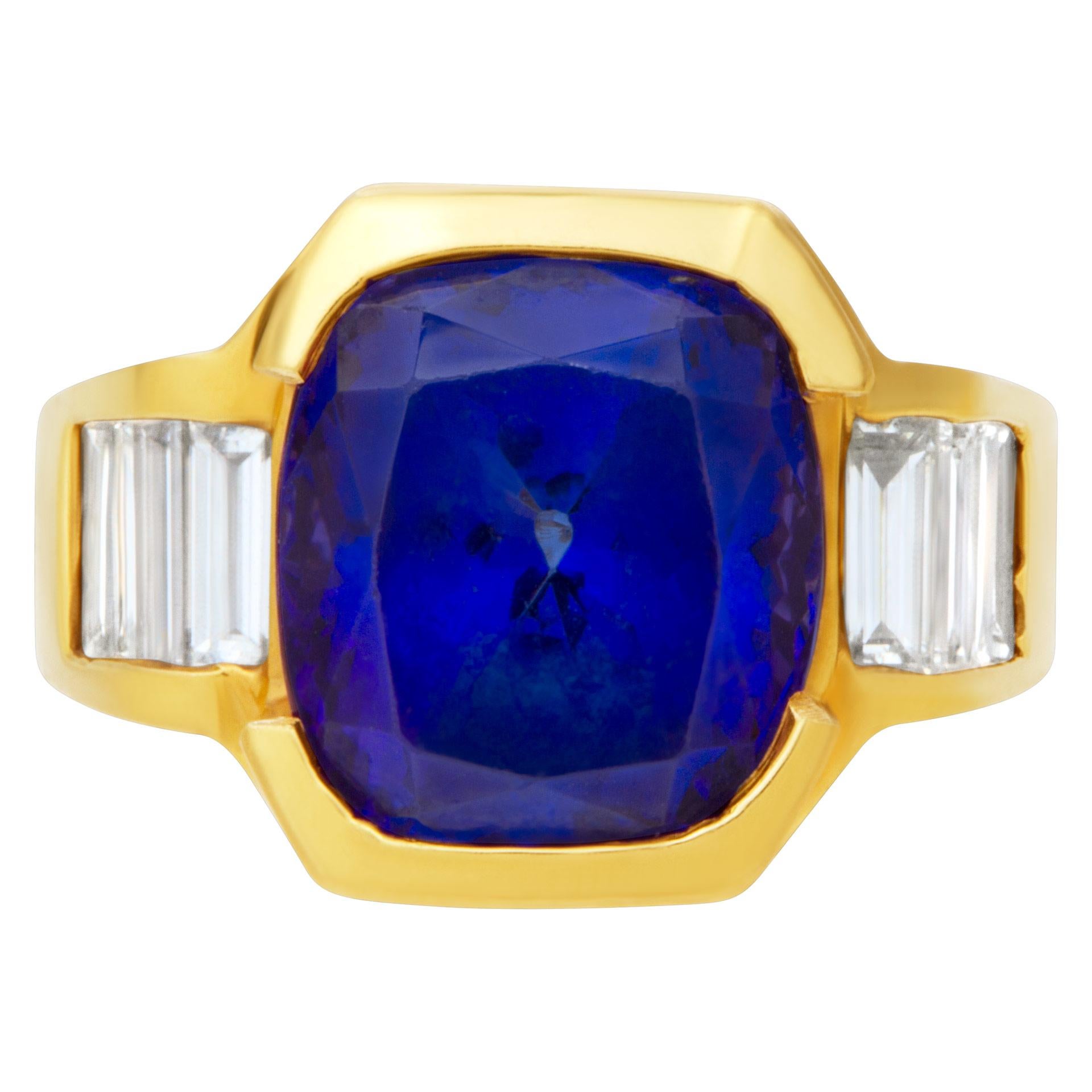 AGL certified striking Violet Blue gem Tanzanite 9.52 carat diamond ring with 8 straight baguette diamonds 1.0 carats mounted in robust 18k setting. Size 6.75. This Tanzanite ring is currently size 6.75 and some items can be sized up or down, please