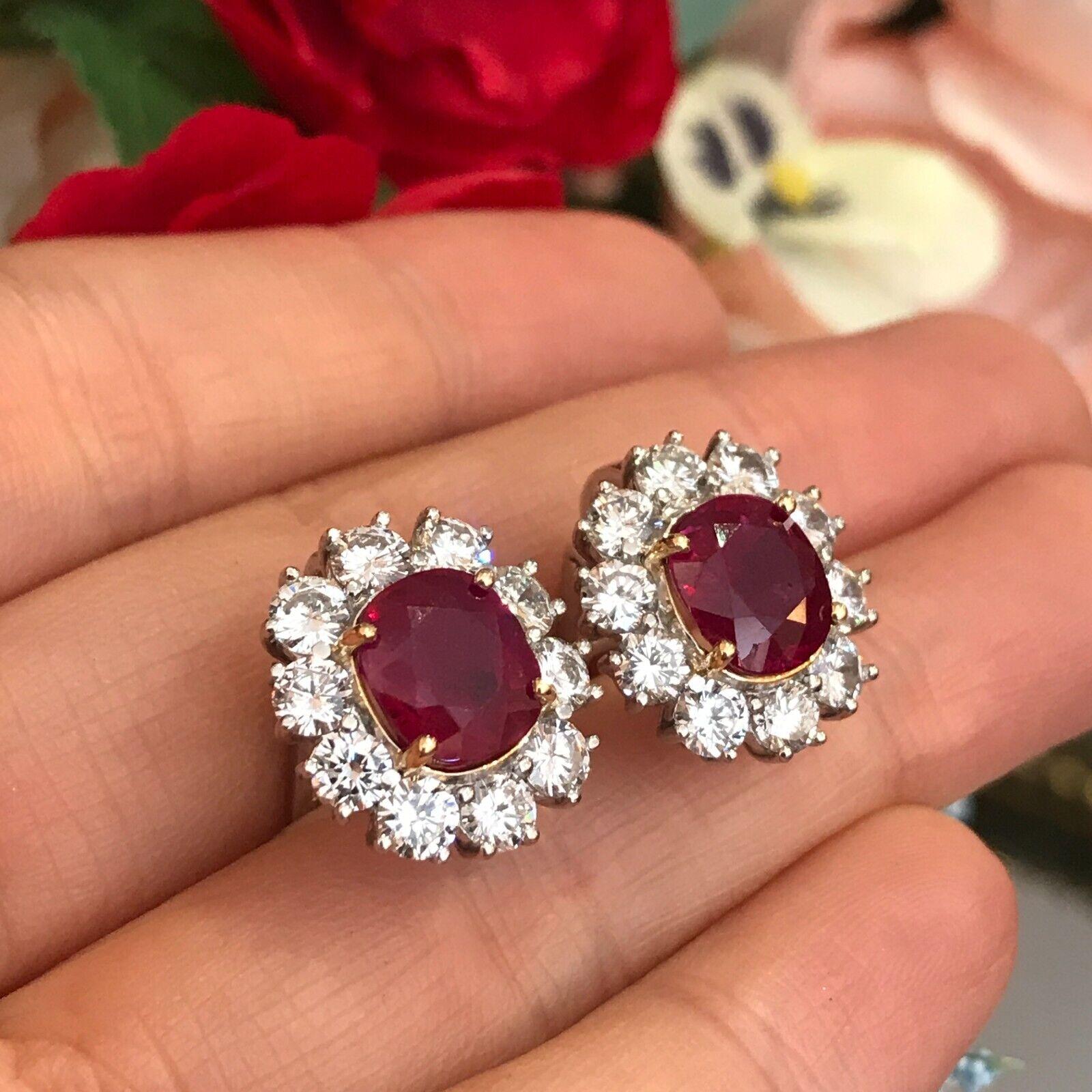 AGL Certified Unheated Cushion Ruby Earrings with Diamonds in Platinum
Features 
Two Natural Cushion shaped Rubies
weighing 5.97 carats in total
with AGL certificate (see photos)
Burma origin
Unheated

set in Platinum settings
with 18k Yellow Gold
