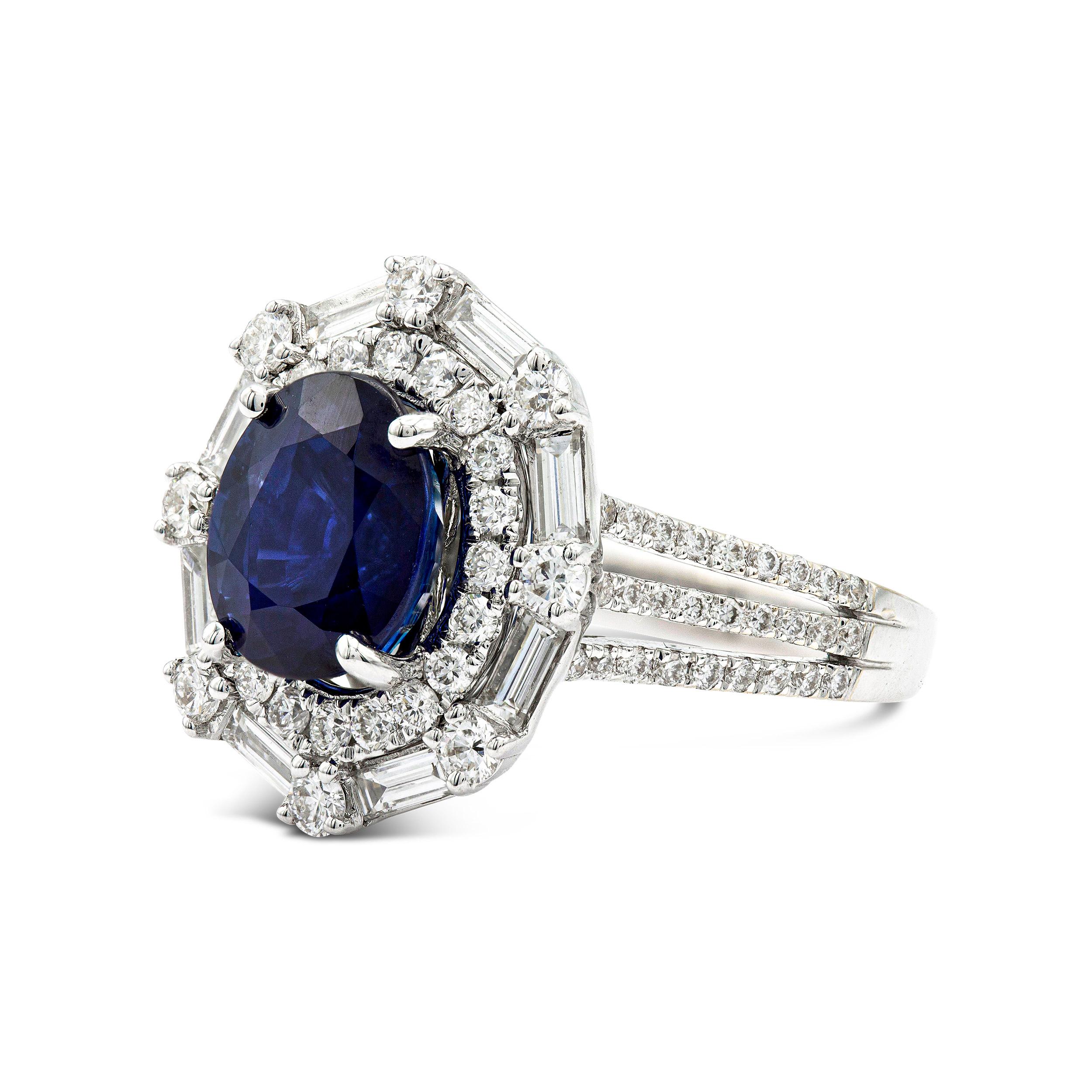 Get lost in the stunningly rich blue color of this 3.70-carat oval sapphire. A double halo of scintillating white diamonds complements the gemstone brilliantly and we love the triple split design of the ring's shank. Wear this bold cocktail piece
