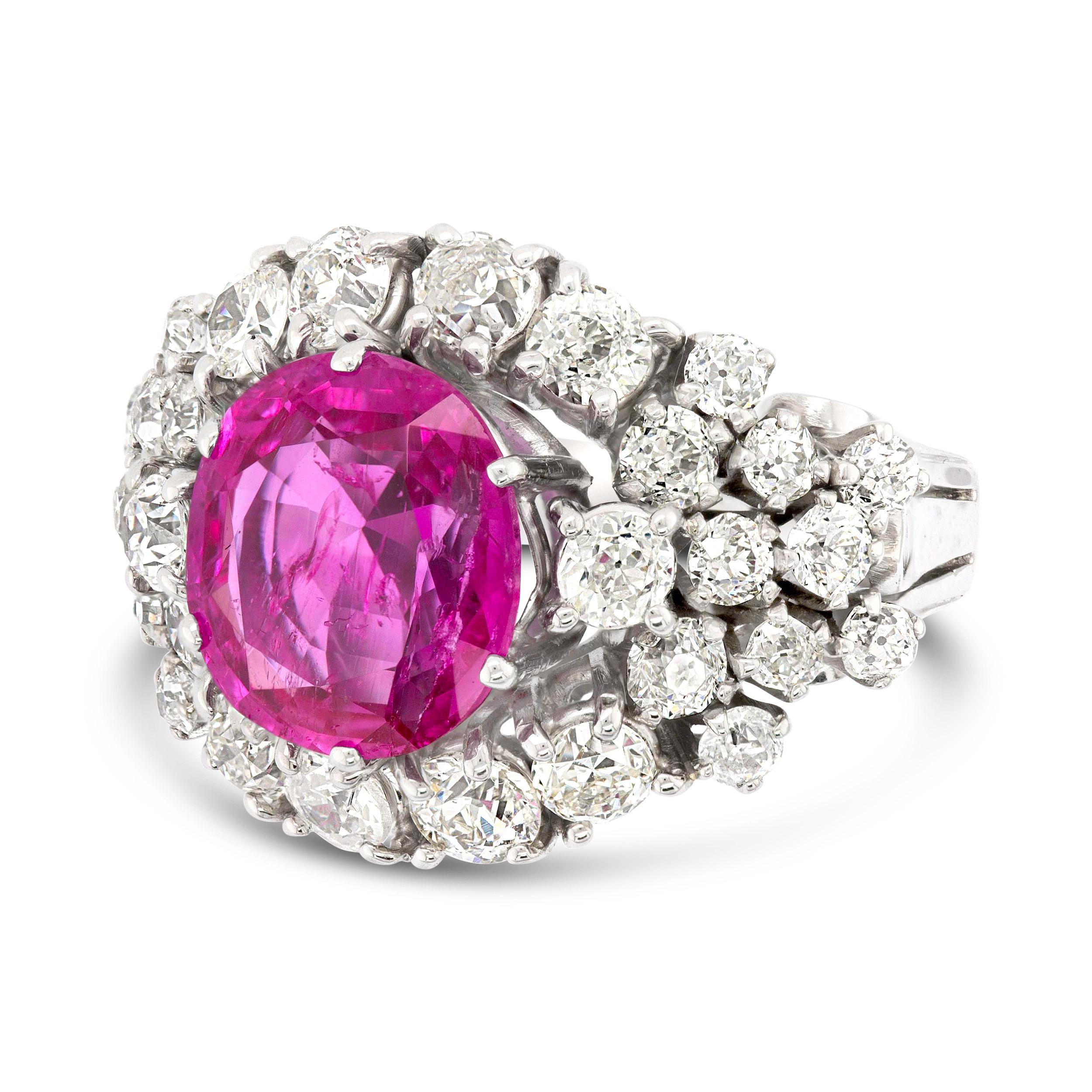 Barbie girl in a diamond world. Graded by AGL, this 4.73 ct. Burma Ruby has the most incredible hue and exhibits the Barbie moment we have all been waiting for. The mixed round diamond stones combined with the ruby create a beautiful contrast making