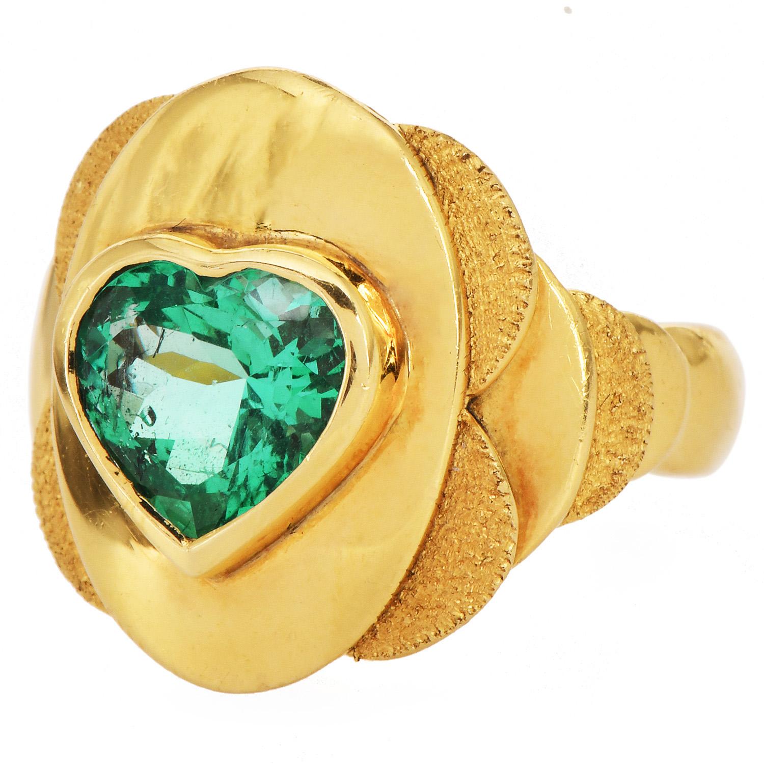 AGL Certified Colombian Emerald Ring in 18K Yellow Gold

Discover the allure of a rare gemstone with our AGL Certified Colombian Emerald Ring. This statement piece features a 3.00 carat heart-shaped, modified, brilliant-cut Colombian emerald extra