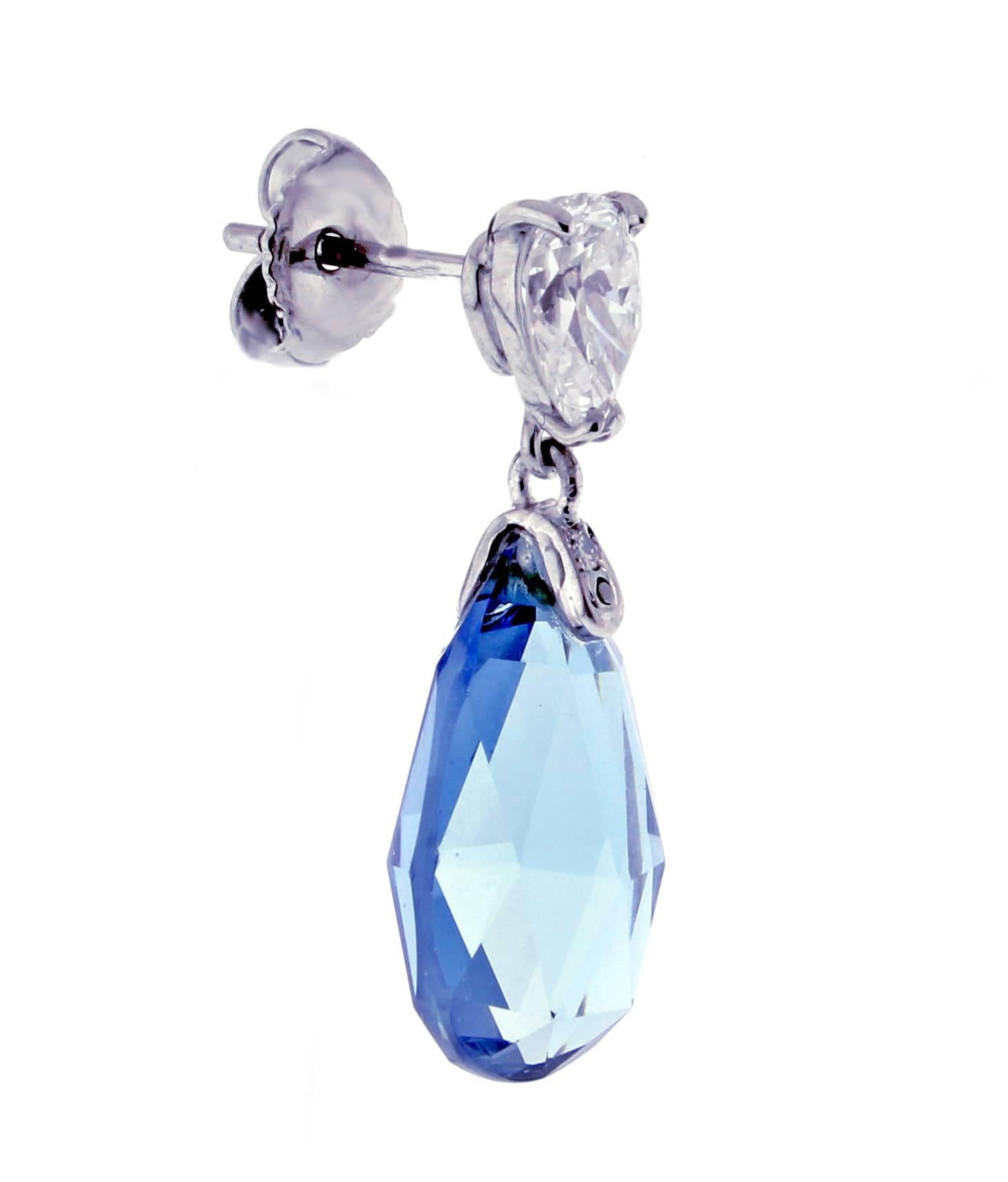 From Pampillonia a magnificent pair of  Santa Maria aquamarine briolettes and  pear-shape diamond earrings.   The two aquamarine briolettes weigh 10 carats, the two pear shape diamonds weigh 1.28 carat. D Color, VS1 clarity. The earring measure one