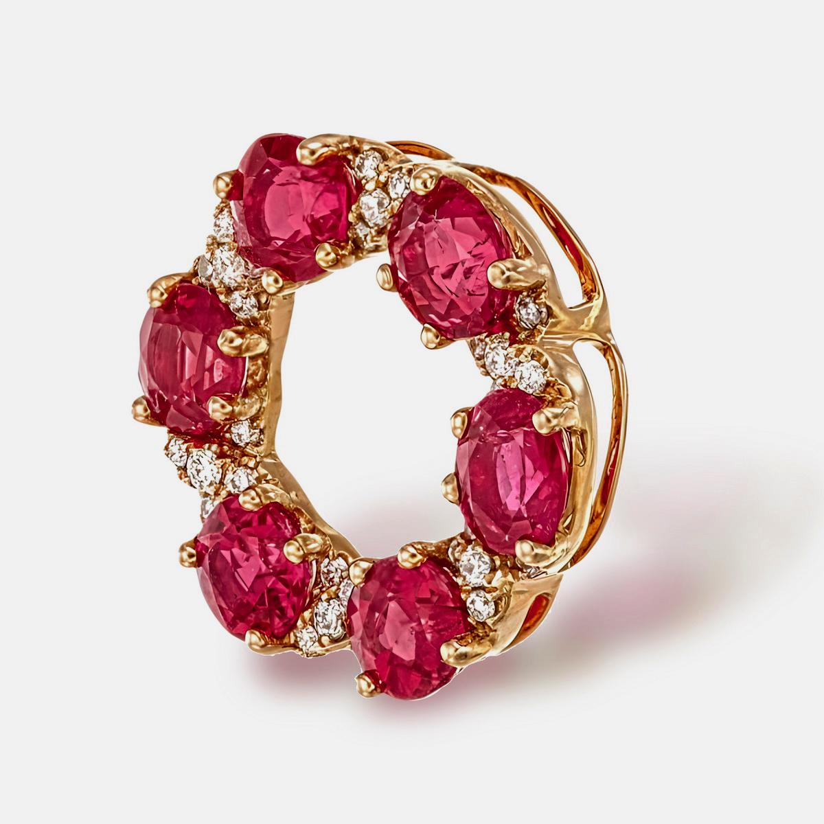 A brand new ruby and diamond pendant necklace by REWA. This piece is composed of 6 certified Burmese, no heat, natural rubies which weigh a total of 1.83 carat. They were certified AGL (Thai) and the report number is 0053972.

There are also 30