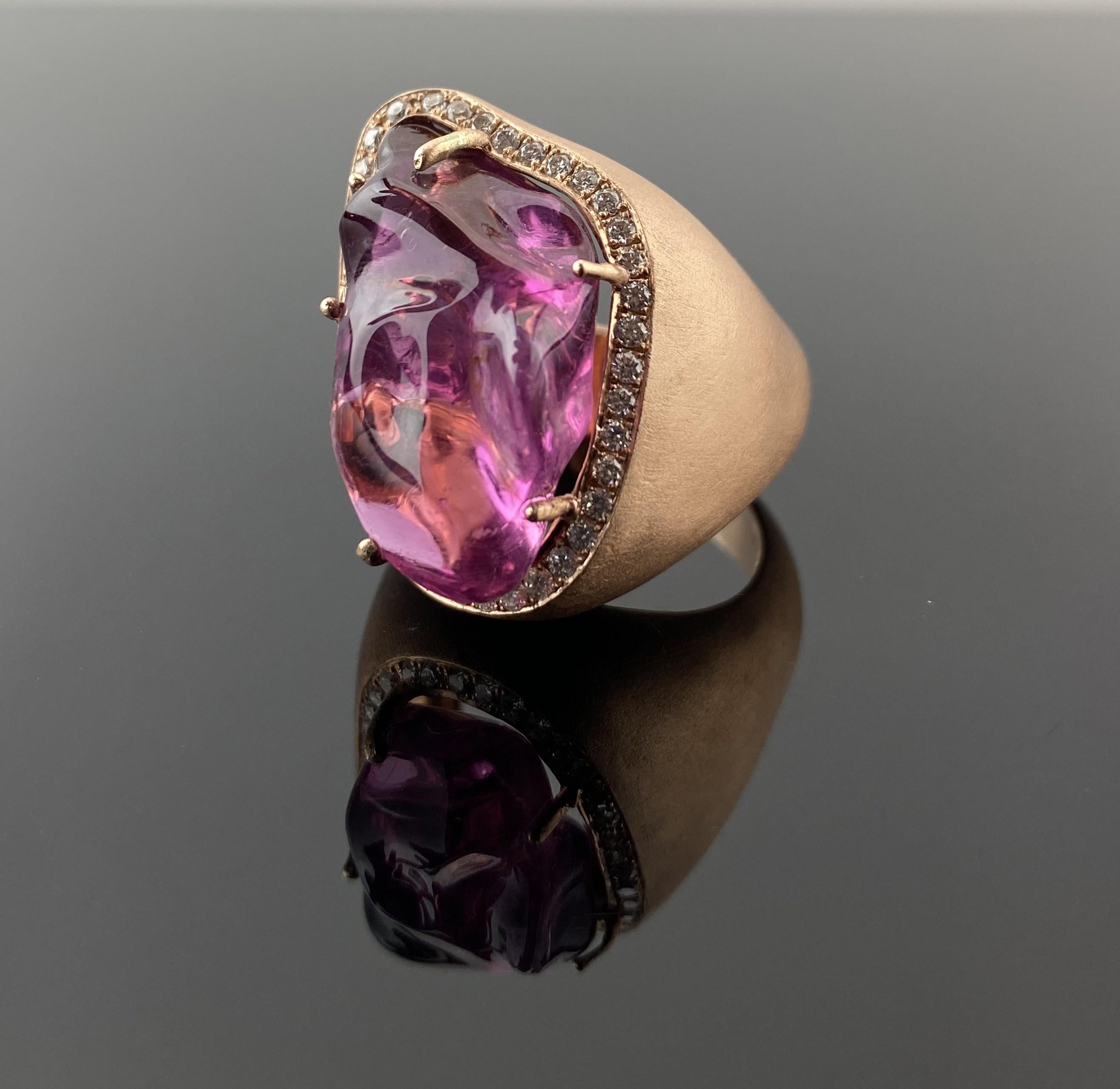 This Cocktail Ring in 9K Rose Gold is bold, sculptural, and undeniably luxurious — this stunning pink tourmaline cocktail ring is a true statement piece in itself. Featuring a 20.35-carat fancy-cut pink tourmaline, the stone’s vivid magenta hues are