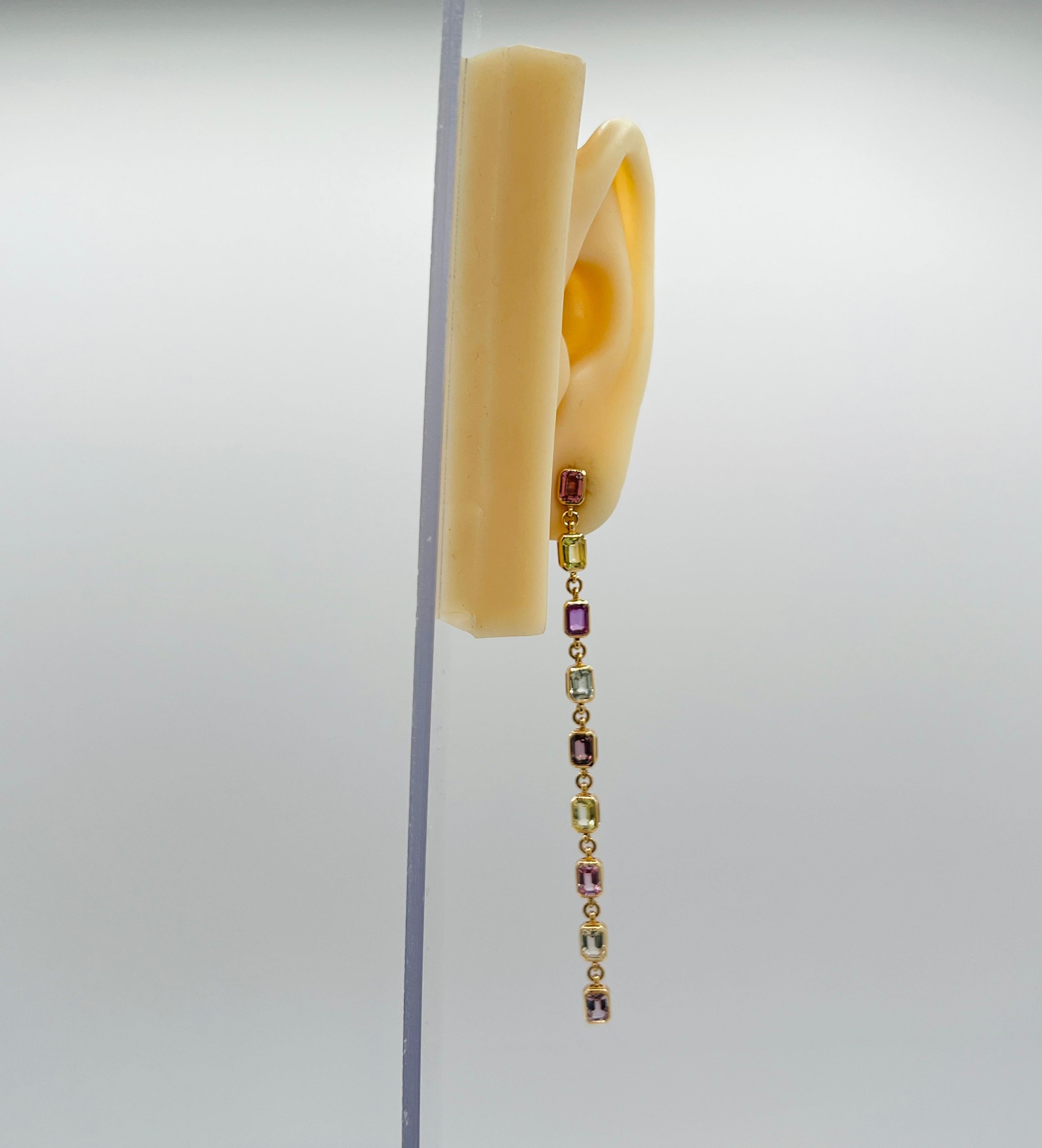 Gorgeous 7.57 ct. unheated multi color sapphire emerald cuts and rounds.  Handmade in 14k yellow gold.  AGL certificate included.