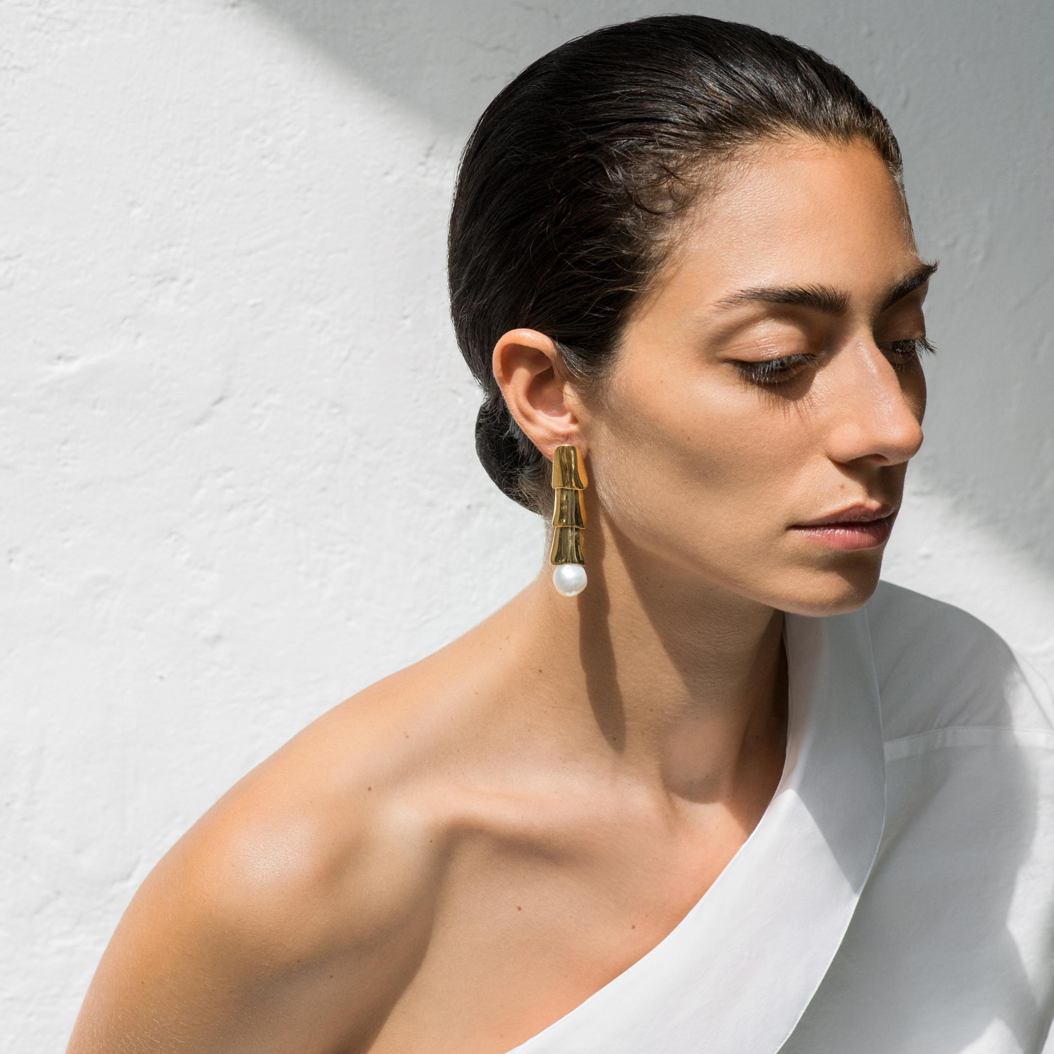 AGMES Gold Vermeil layered Drop Earrings with Freshwater Pearls.
Sterling Silver Post.
Also available in Sterling Silver.  Kindly contact us if interested for further information.
Handmade in NYC.  
Inspired by urban landscapes, architecture and