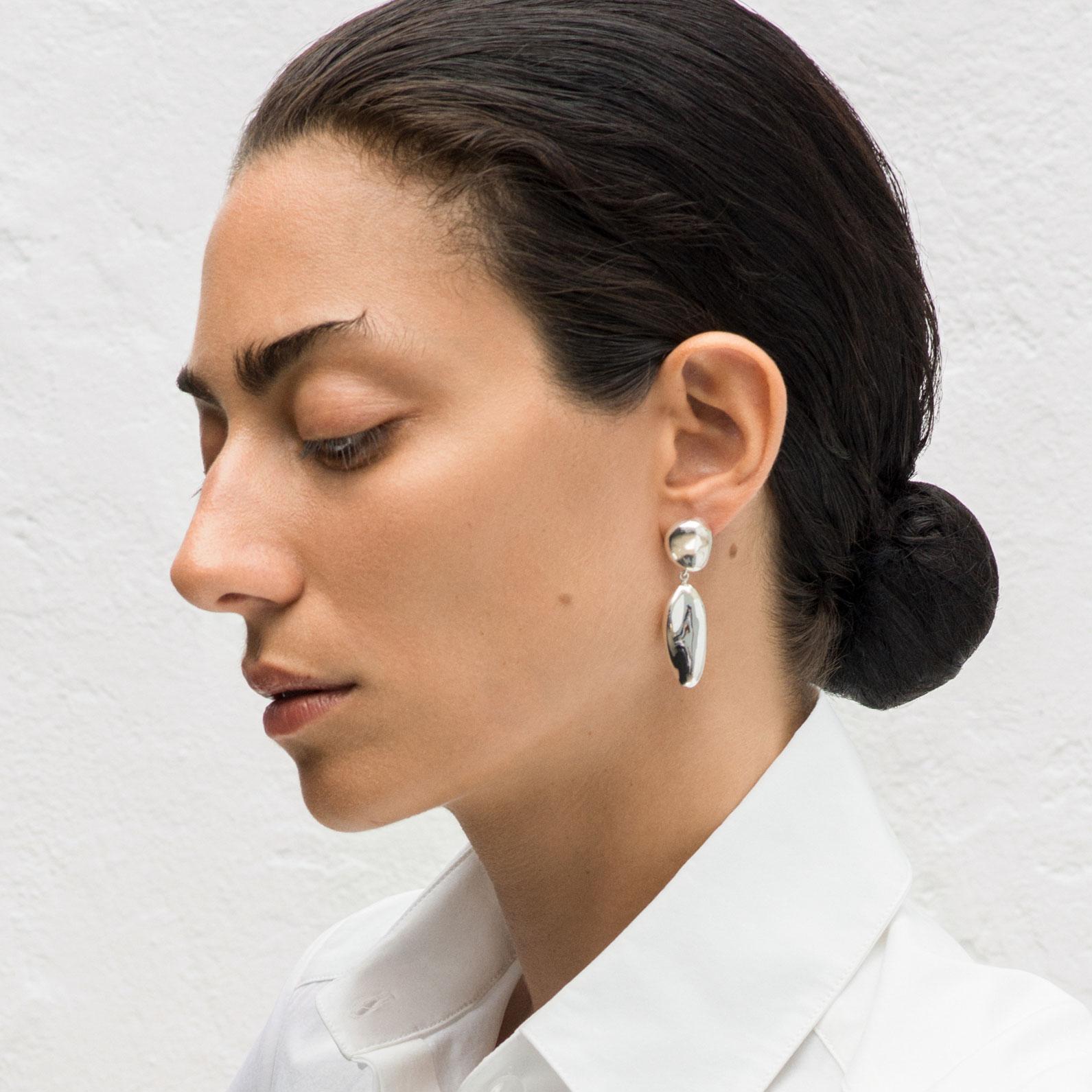 AGMES Sterling Silver Sculptural Drop Earrings.
Sterling Silver post.
Also available in Gold Vermeil.  Kindly contact us if interested.
Handmade in New York City.
Inspired by urban landscapes, architecture and modern art, the collection creates a