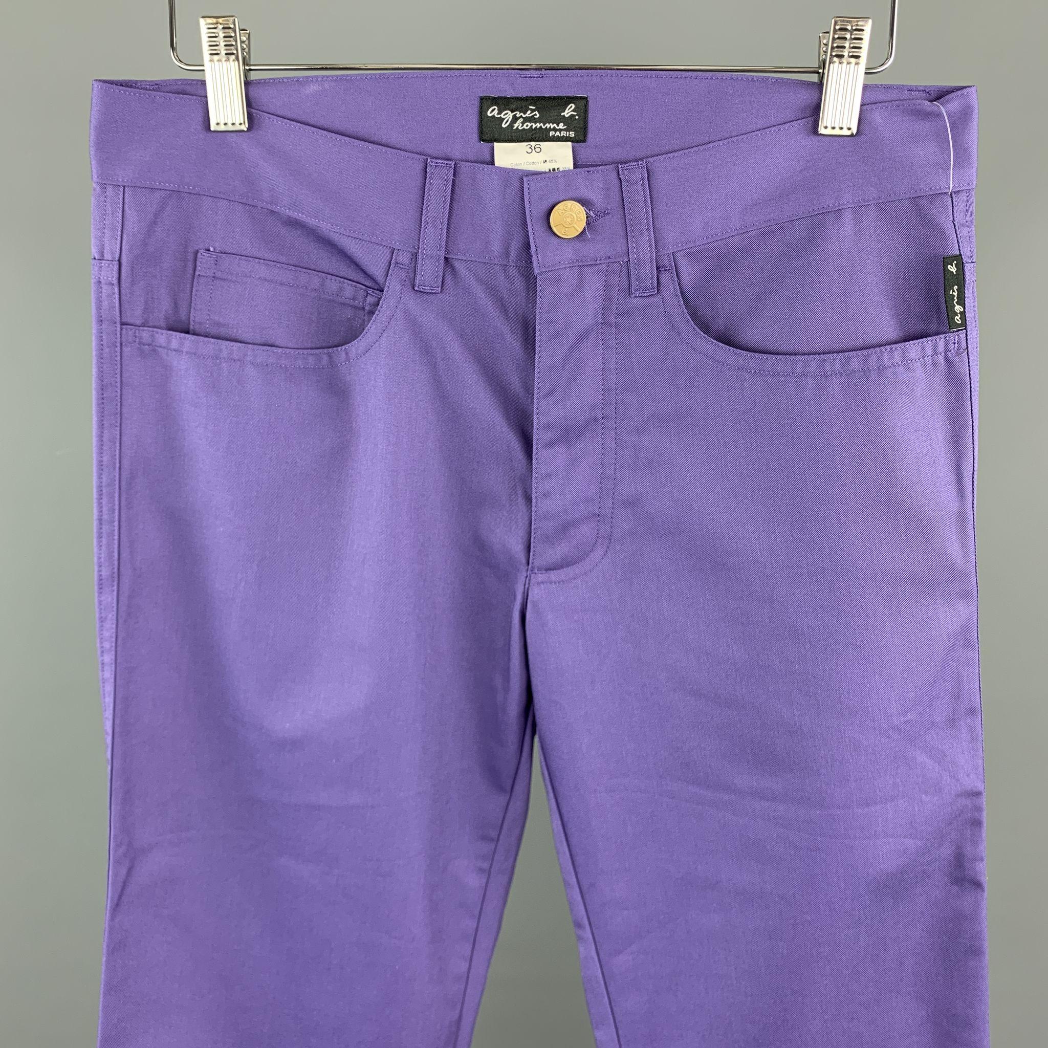 AGNES B. Casual Pants comes in a purple cotton blend featuring a jean cut style and a button up closure. 

Brand New.
Marked: 36

Measurements:

Waist: 30 in. 
Rise: 8 in. 
Inseam: 34 in. 