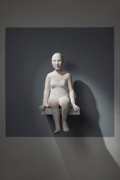 Seated female figure: 'Ngeuse rèflèchie'