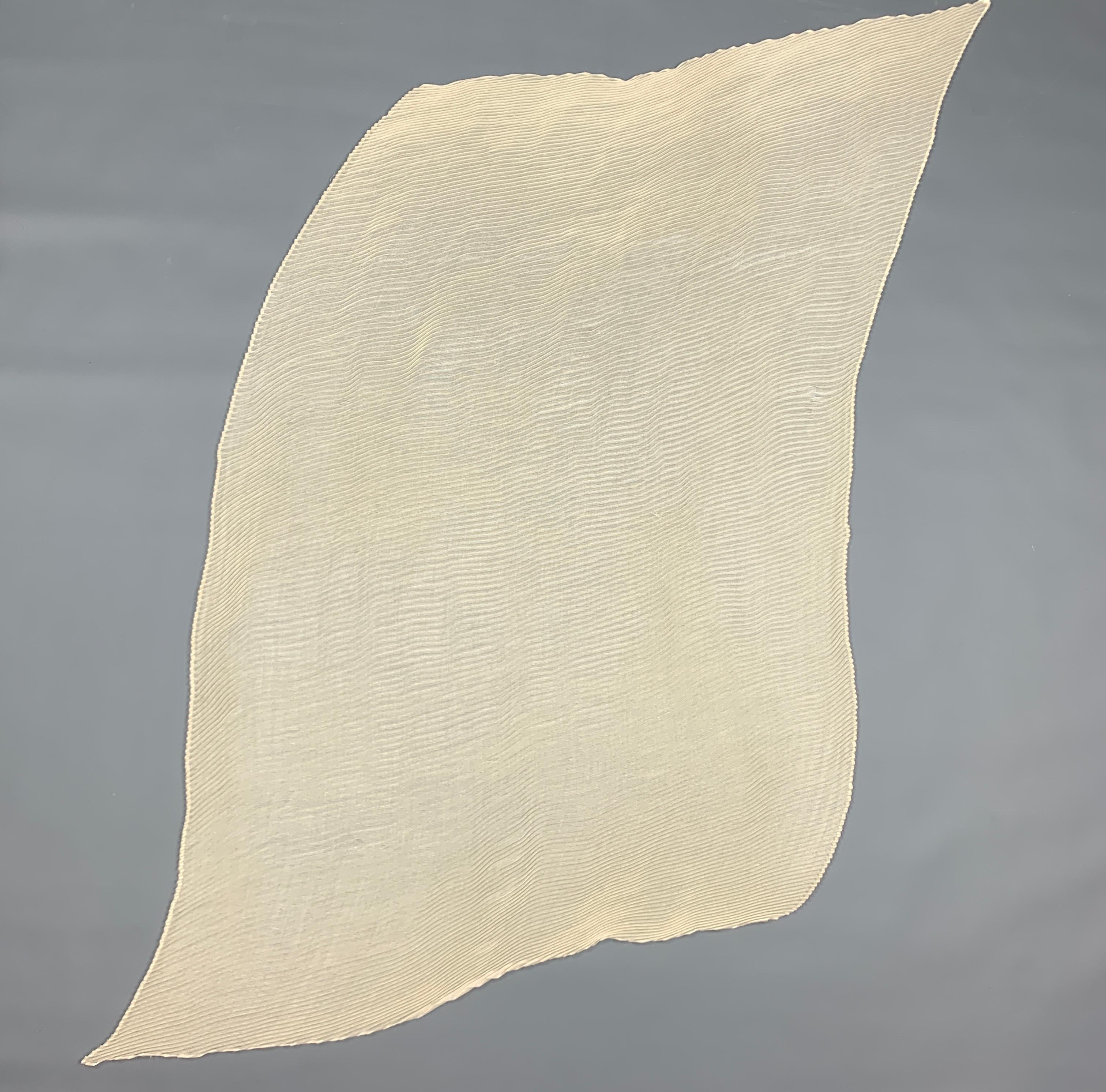 AGNONA scarf comes in a cream cashmere / silk featuring a rectangle shape and a pleated style. Made in Italy.
 
Excellent Pre-Owned Condition.
Marked:
 
Measurements:
 
78 in. x 31 in.