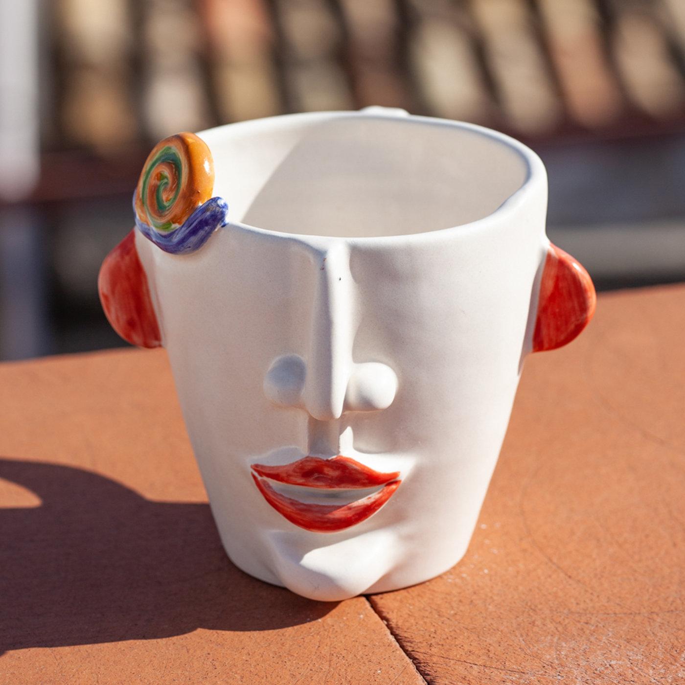 Ideal to serve coffee or tea in the morning with an accent of irony, this set of three anthropomorphic ceramic mugs was minutely handcrafted by master ceramist Patrizia Italiano as an homage to Sicilian street vendors. Agostino, street seller of