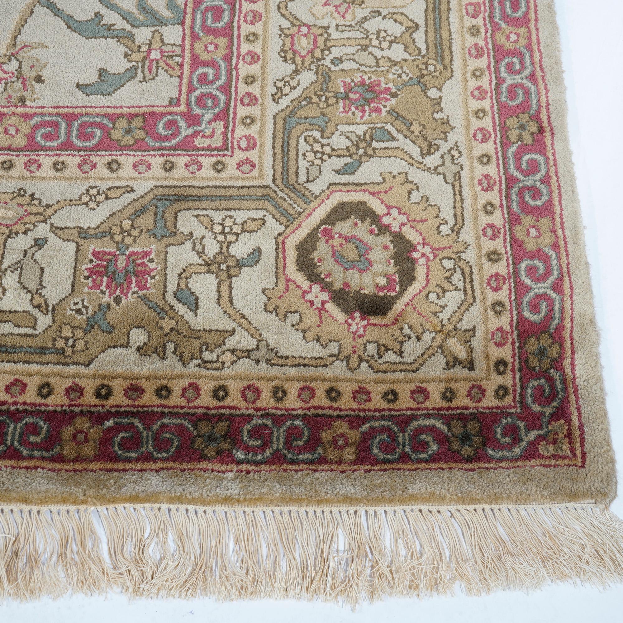 An Indo Agra carpet offers wool construction with repeating pattern of stylized floral vases as photographed, 20th century

Measures- 122'' L x 99.5'' W x .5'' D.

Catalogue Note: Ask about DISCOUNTED DELIVERY RATES available to most regions within