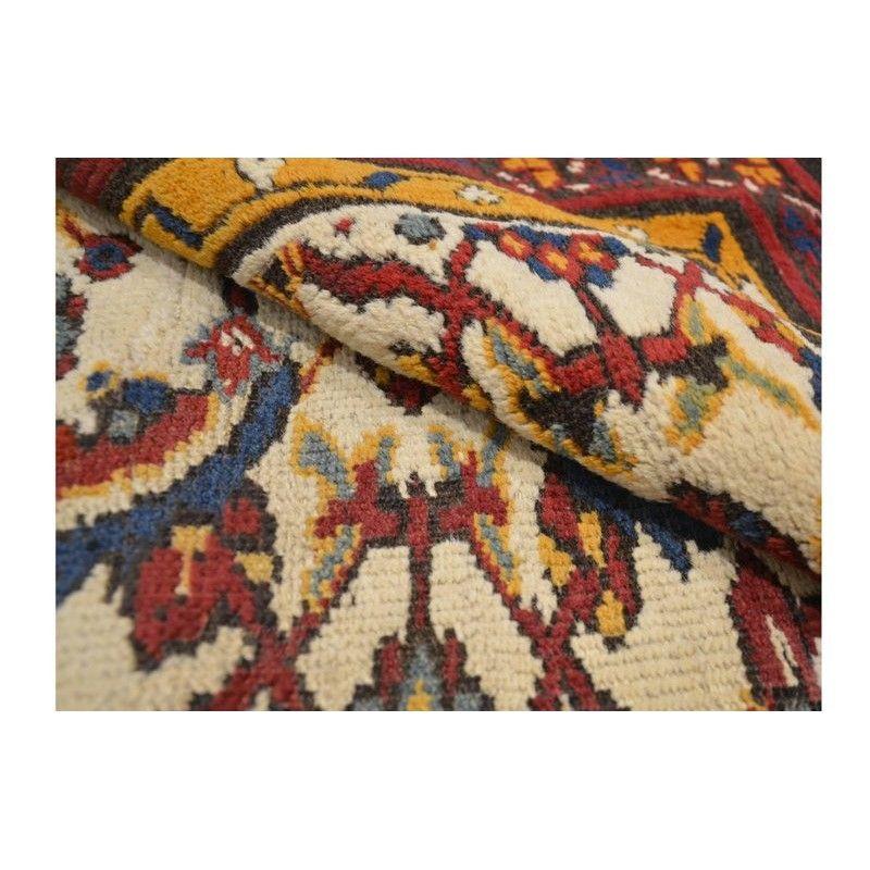 Indian Agra Rug in Reds and Yellows on a Beige Background. For Sale
